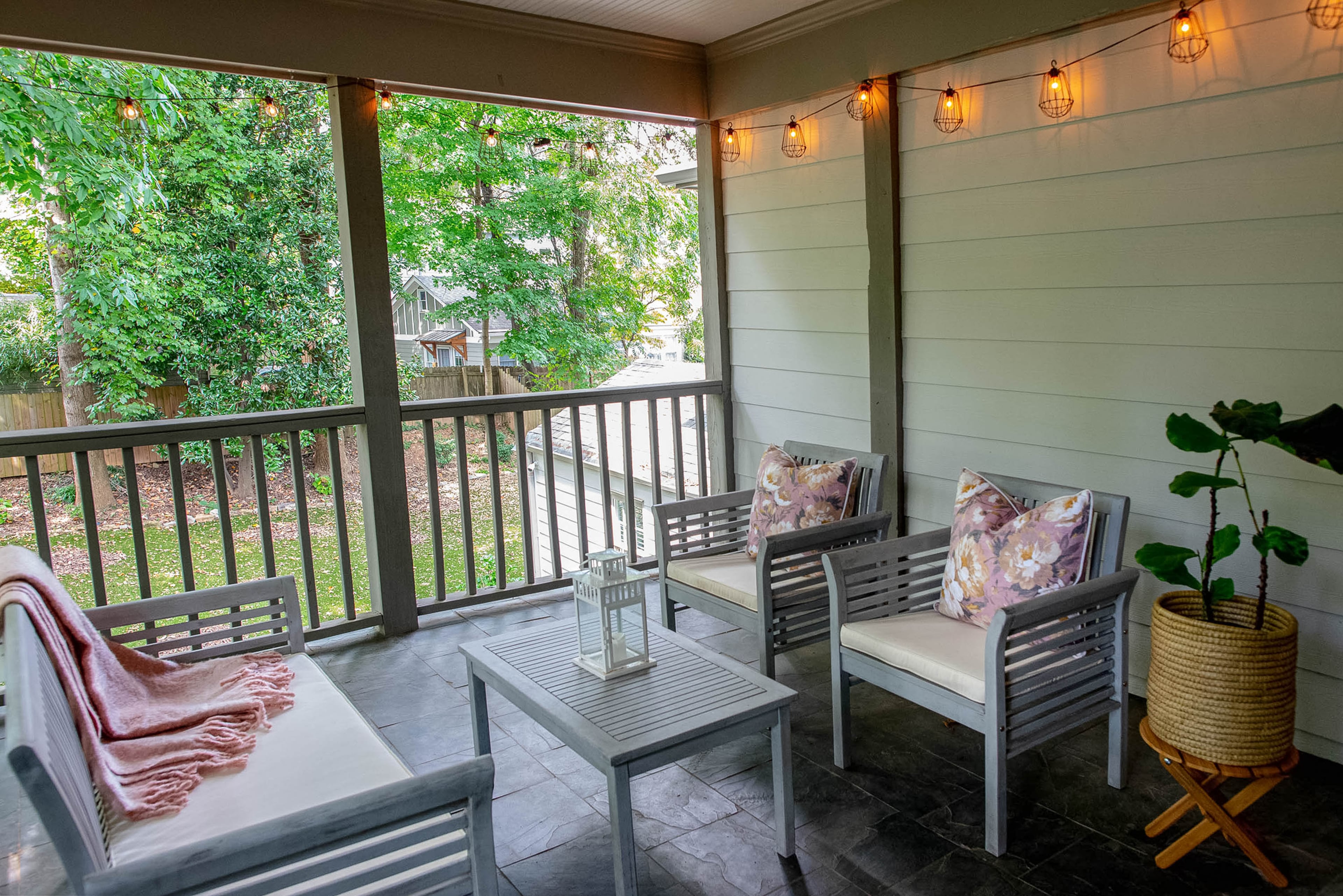 The covered porch was added off the second-story master bedroom during renovations by previous owners.