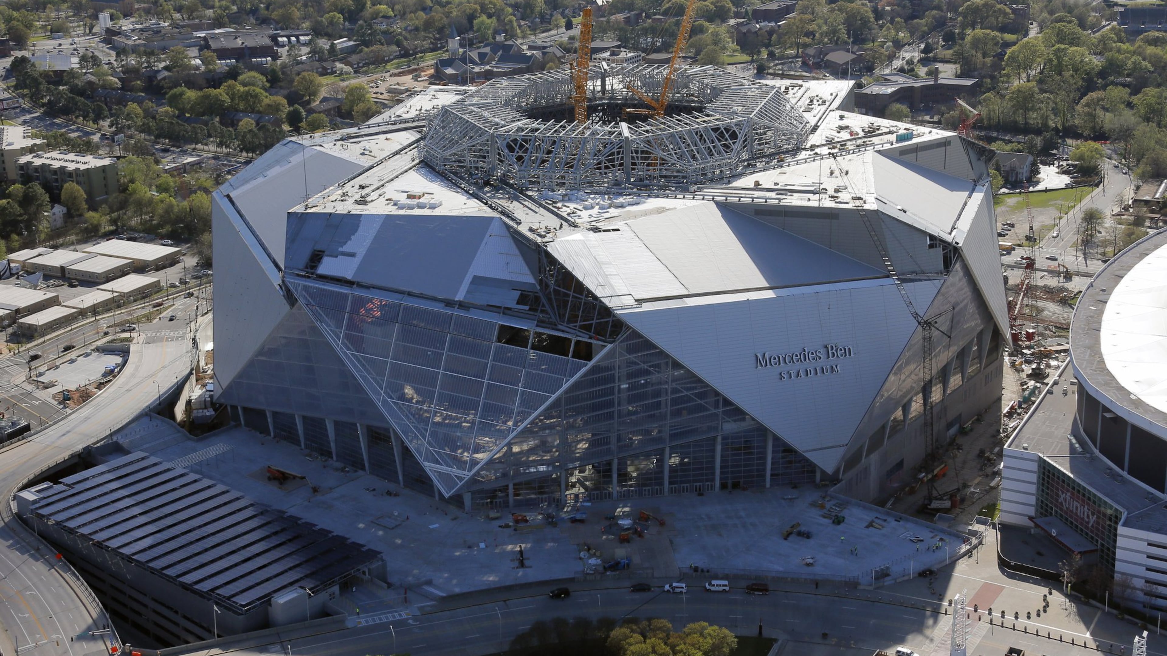 Mercedes-Benz Stadium is now scheduled to open in late August. BOB ANDRES /BANDRES@AJC.COM