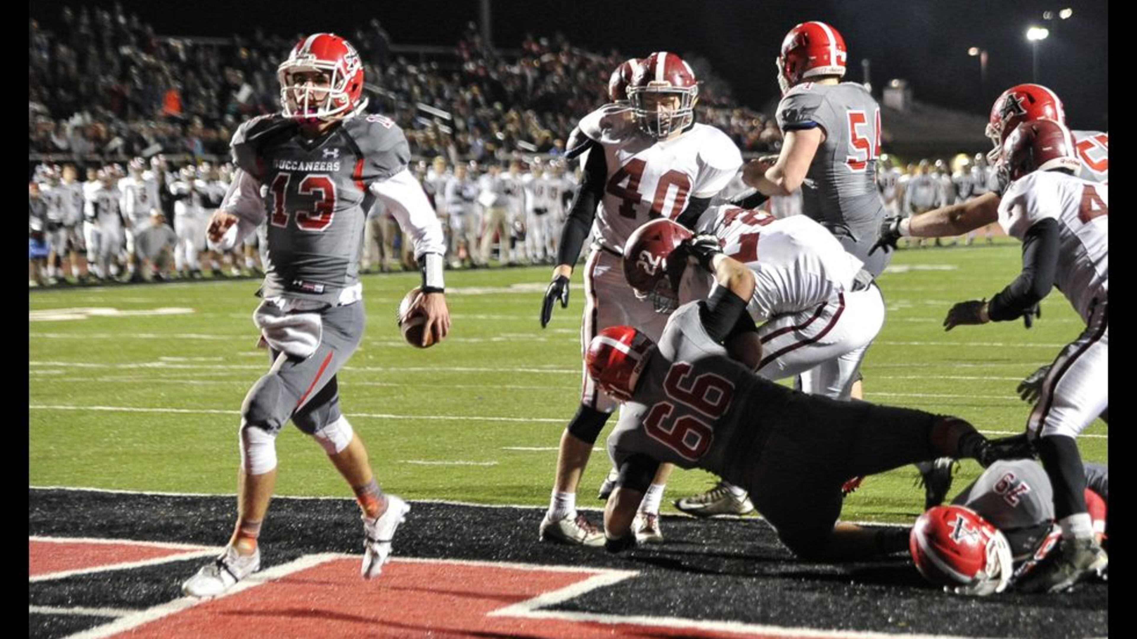 Alatoona QB Brandon Rainey (13) scores a touchdown against Northgate during a high school football playoff game, Friday, Dec. 4, 2015, in Acworth. (Photo/John Amis)