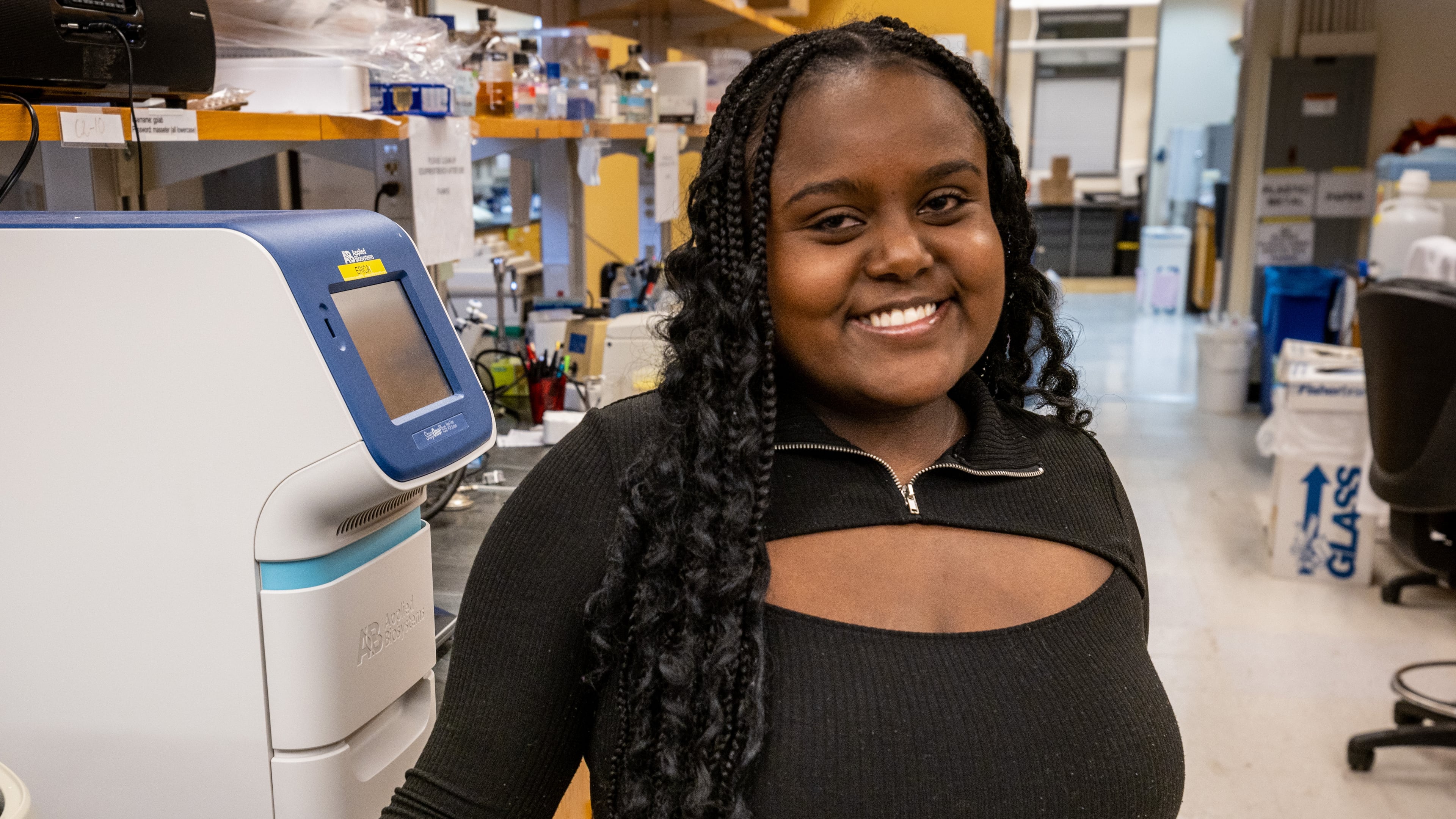 Emory University junior Hasset Nurelegne poses for a photograph in her workspace at the O. Wayne Rollins Research Center on the Emory campus Tuesday, Mar 12, 2023. (Steve Schaefer/steve.schaefer@ajc.com)