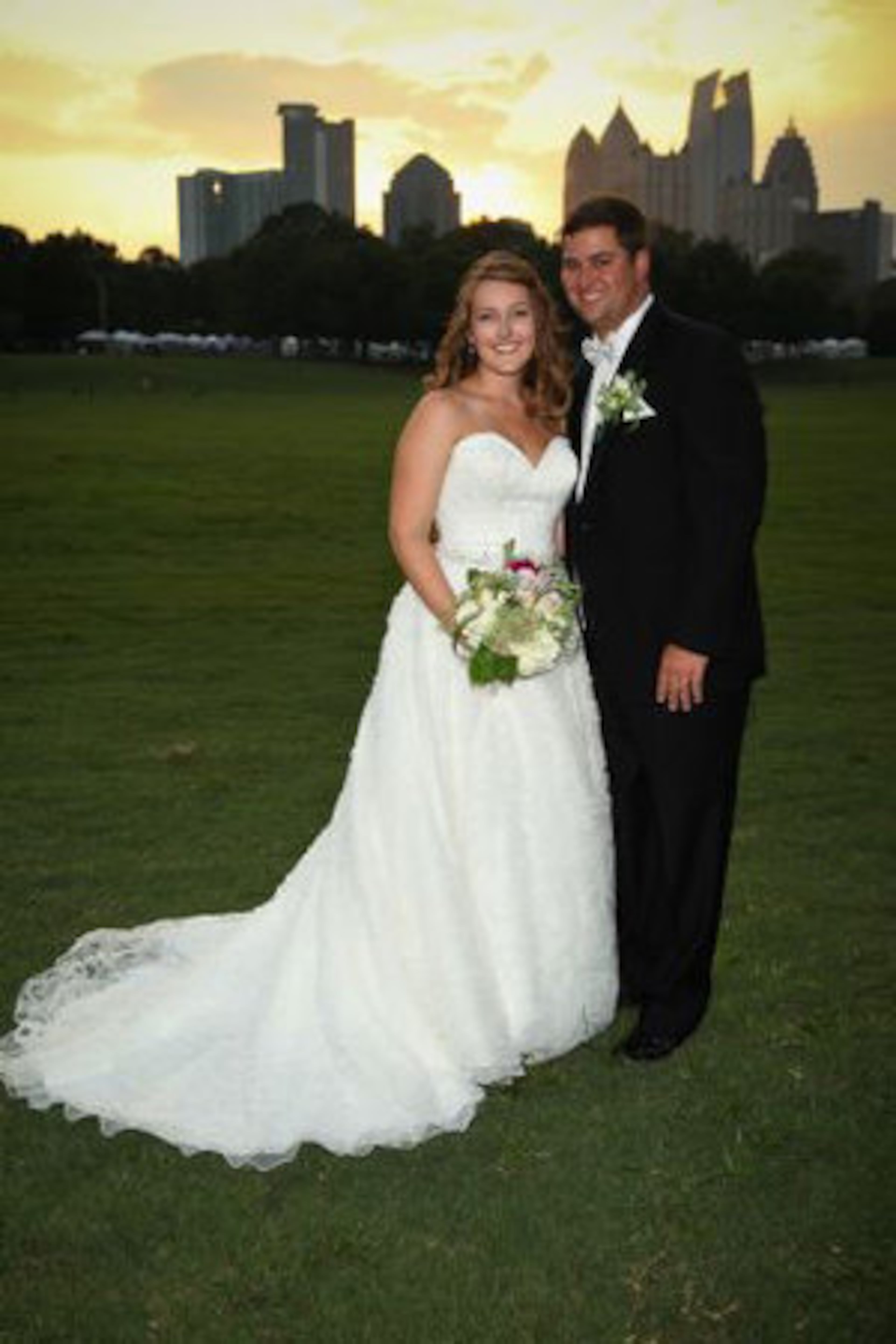 Mr. and Mrs. Christopher Mayer were married August 20, 2011 at the Piedmont Room in Atlanta, GA. Christopher's grandfather, Rev. Max Johnson, presided over the ceremony as the sun was setting on Piedmont Park. The couple now resides in Sandy Springs.