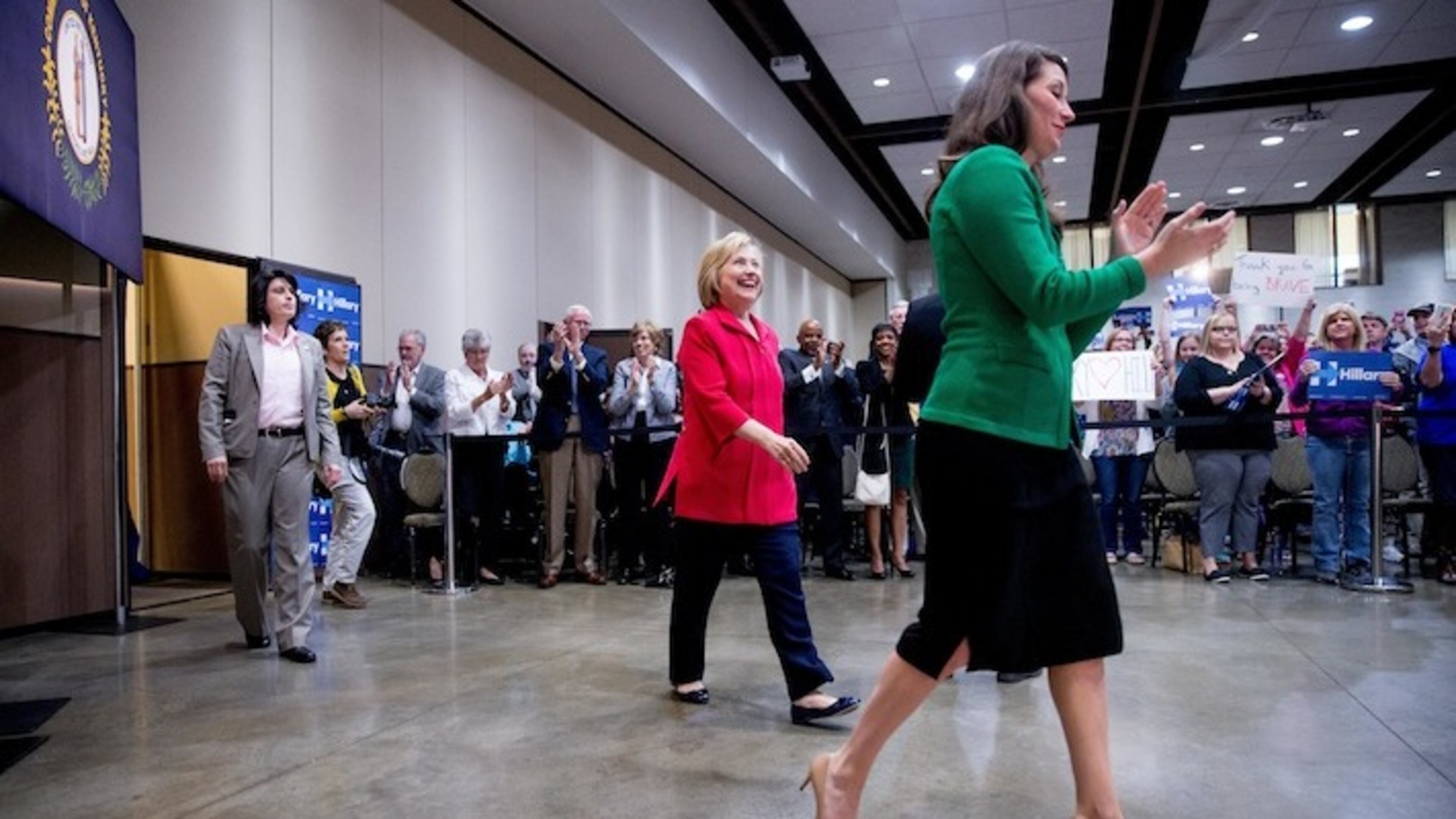 Democratic presidential candidate Hillary Clinton, center, accompanied by Kentucky Secretary of State Alison Lundergan Grimes, right, speaks at a get out the vote event at James E. Bruce Convention Center in Hopkinsville, Ky., Monday, May 16, 2016. (AP Photo/Andrew Harnik)