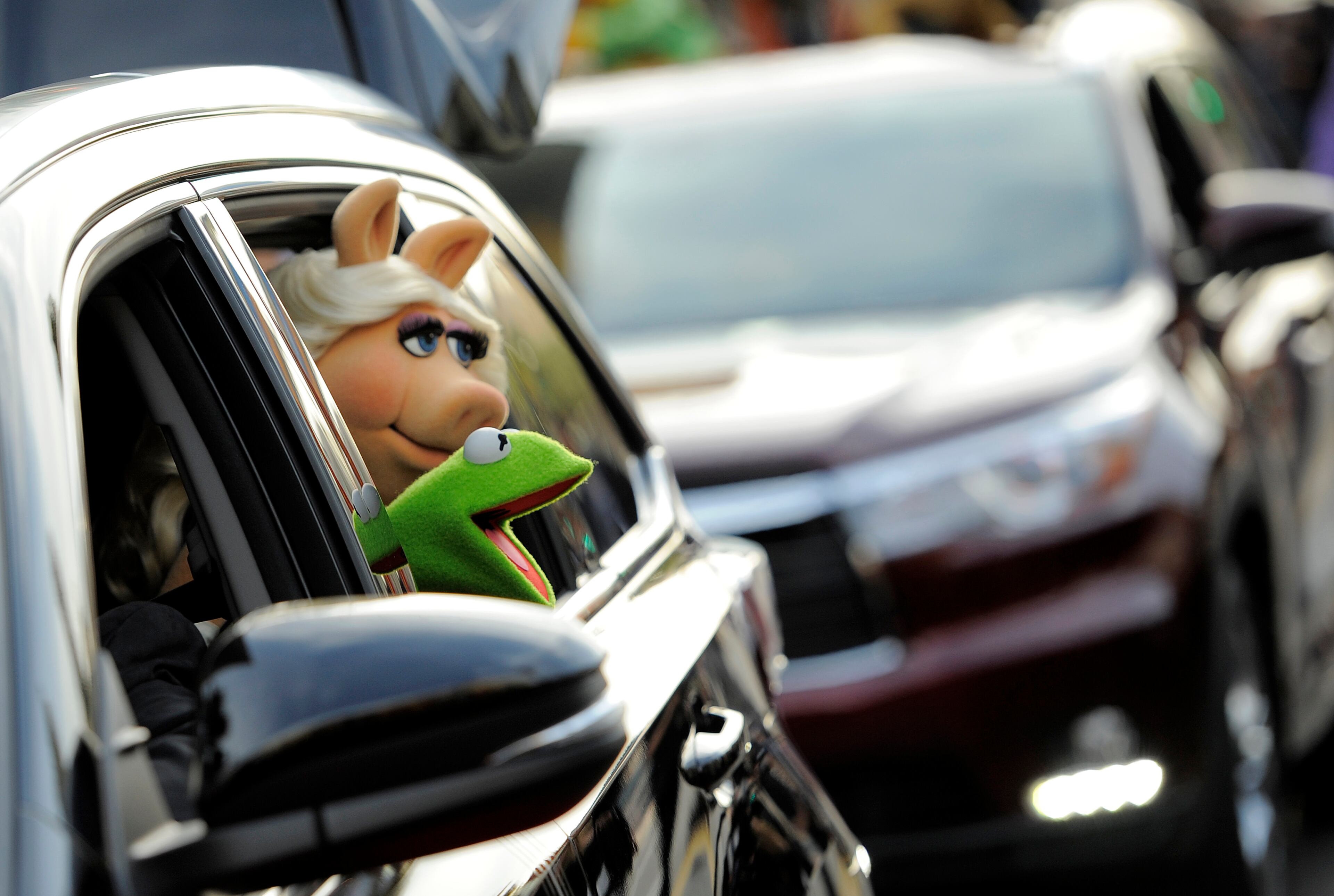 "Muppets Most Wanted" characters Kermit the Frog and Miss Piggy arrive at the premiere of the film on Tuesday, March 11, 2014, in Los Angeles. (Photo by Chris Pizzello/Invision/AP)