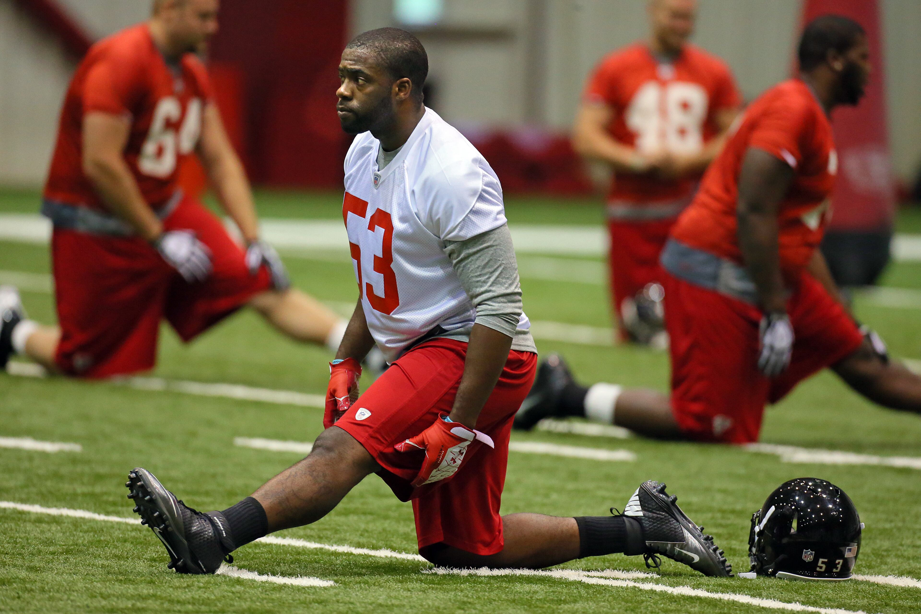 Banks stretches with the team for afternoon practice during rookie minicamp on Saturday, May 4, 2013, in Flowery Branch.