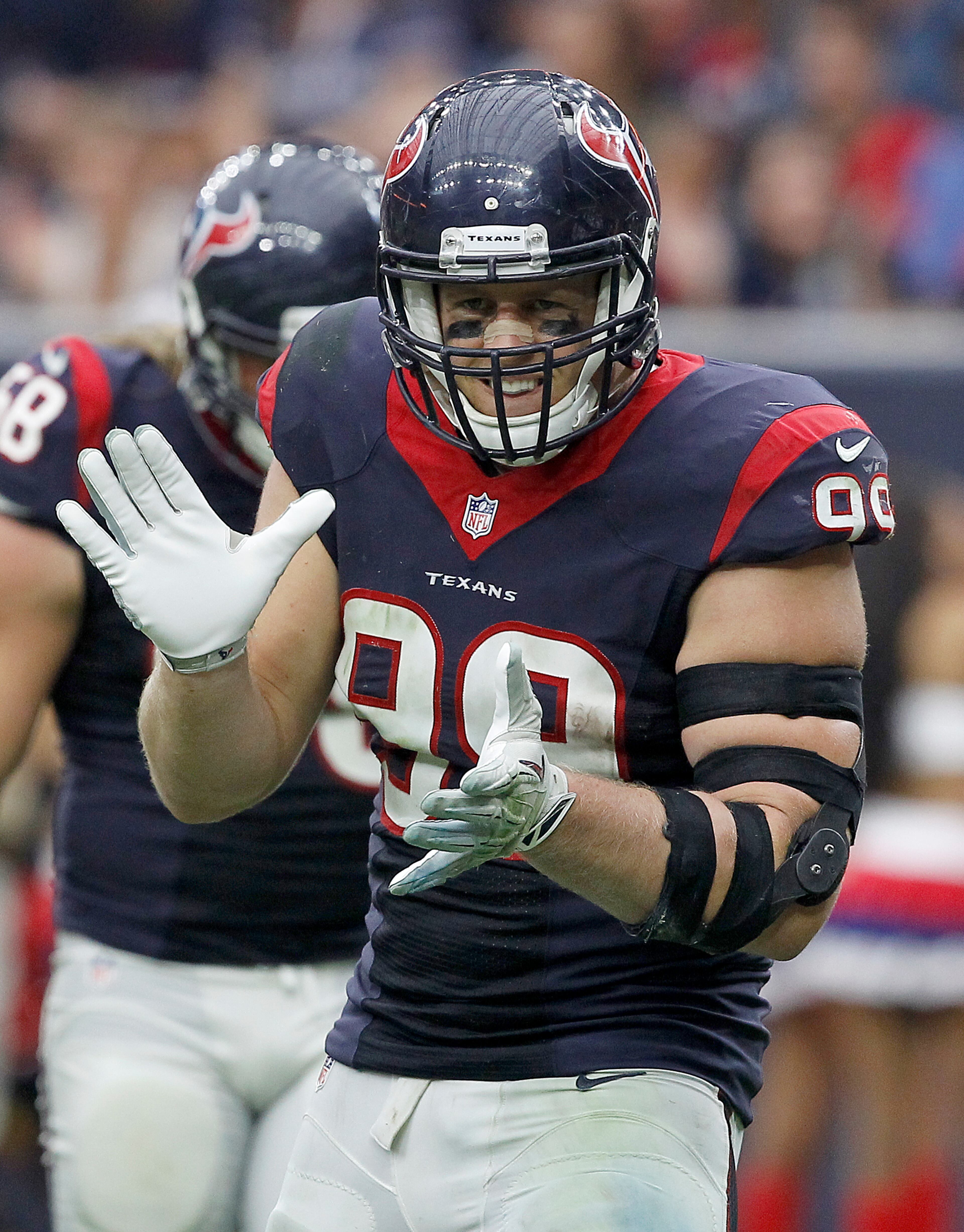 J.J. Watt fires up his team in a game against the Buffalo Bills. (Photo by Bob Levey/Getty Images)