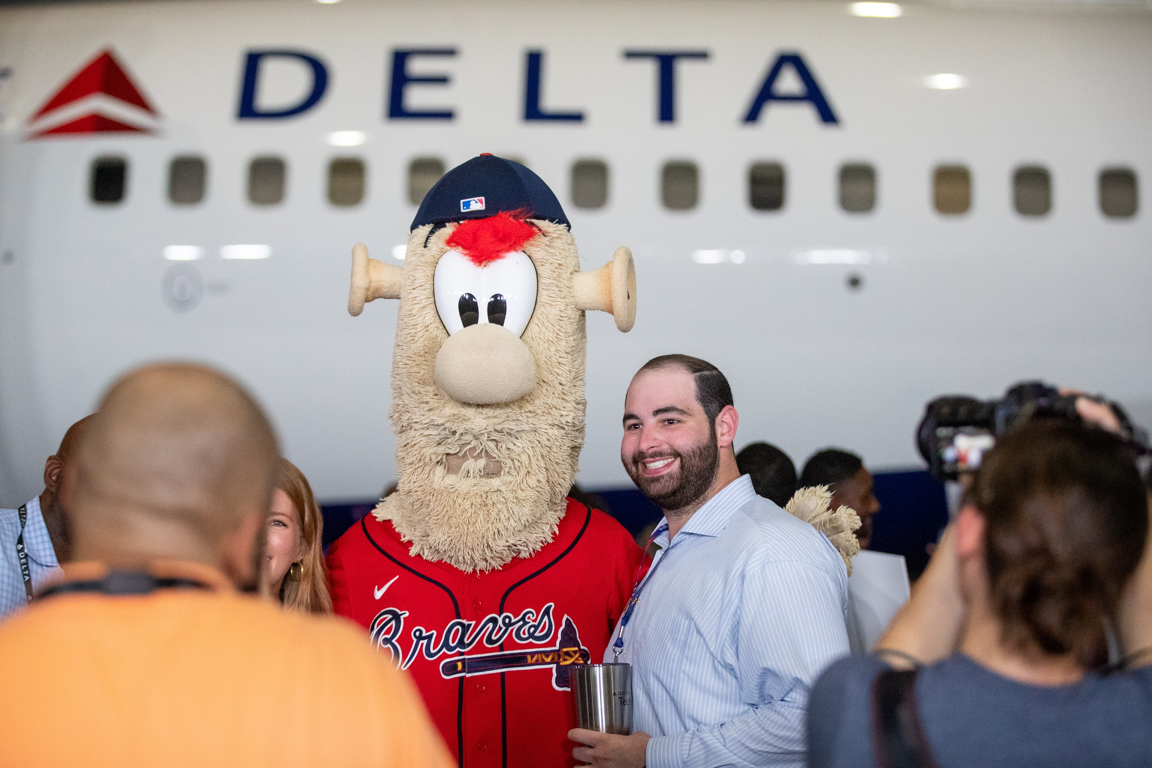 Braves mascot Blooper poses for photographs before a ceremony that revealed the Delta Air Lines jet dedicated to the Braves championship Thursday, July 28, 2022. (Steve Schaefer / steve.schaefer@ajc.com)