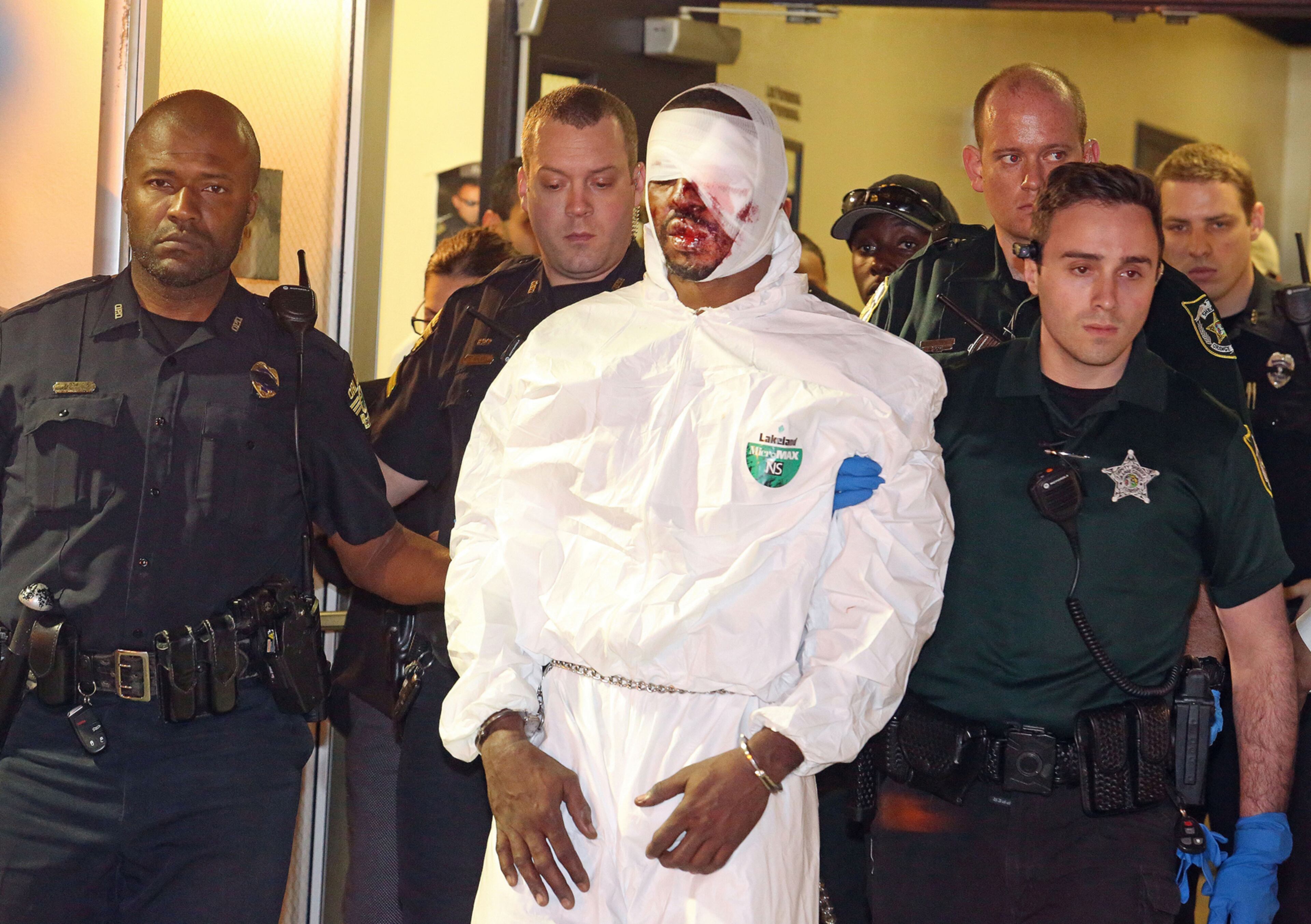 Murder suspect Markeith Loyd is escorted out of Orlando Police headquarters Tuesday, Jan. 17, 2017 after being captured earlier this evening in Orlando, Fla. Orlando Police Master Sgt. Debra Clayton, 42, was shot by suspect Markeith Loyd outside a Walmart store last week in west Orlando. (Red Huber/Orlando Sentinel/TNS)