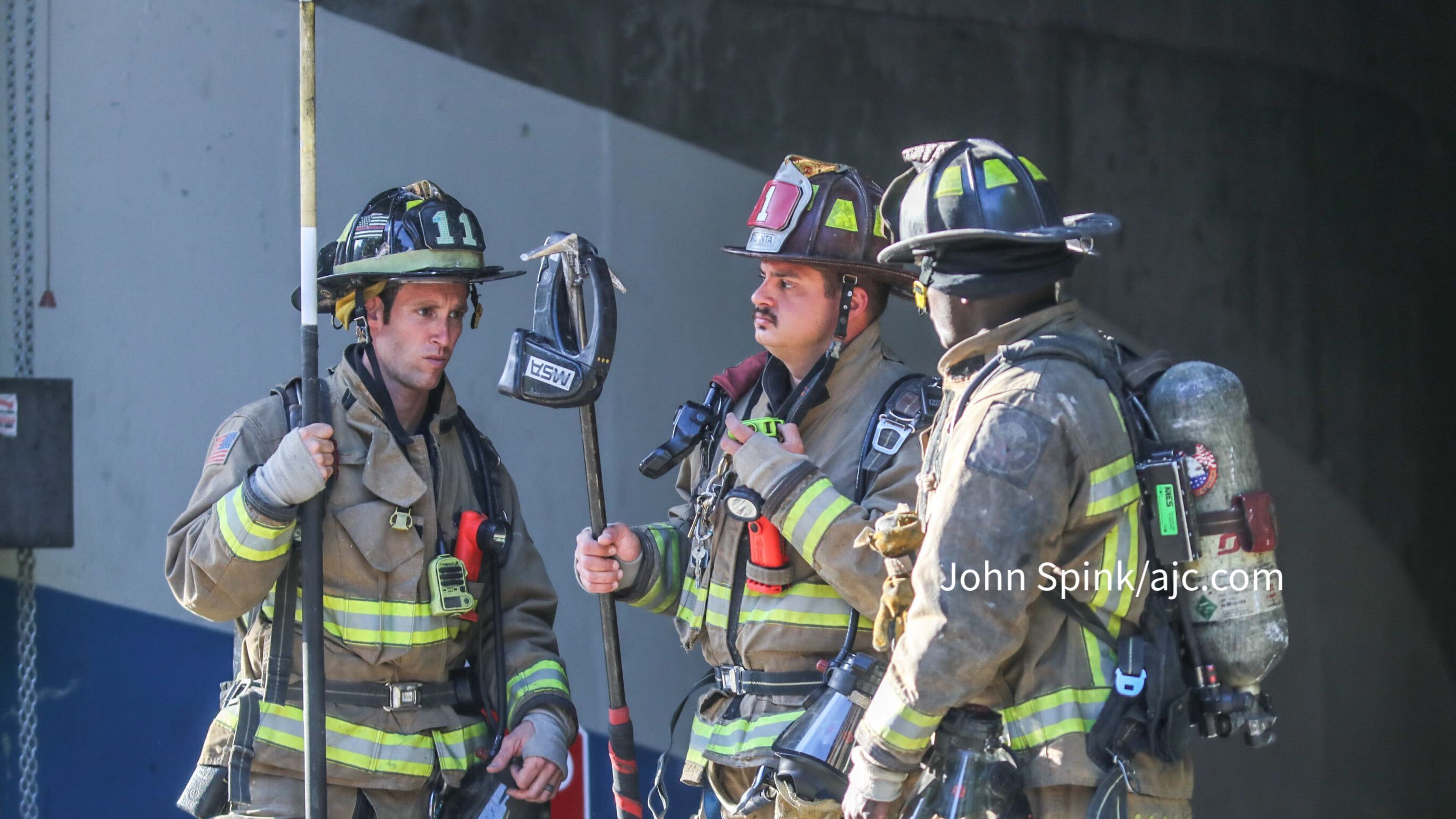 Atlanta fire crews were called to the high-rise on West Peachtree Street after reports of an explosion. Investigators later determined that part of a sprinkler system malfunctioned.