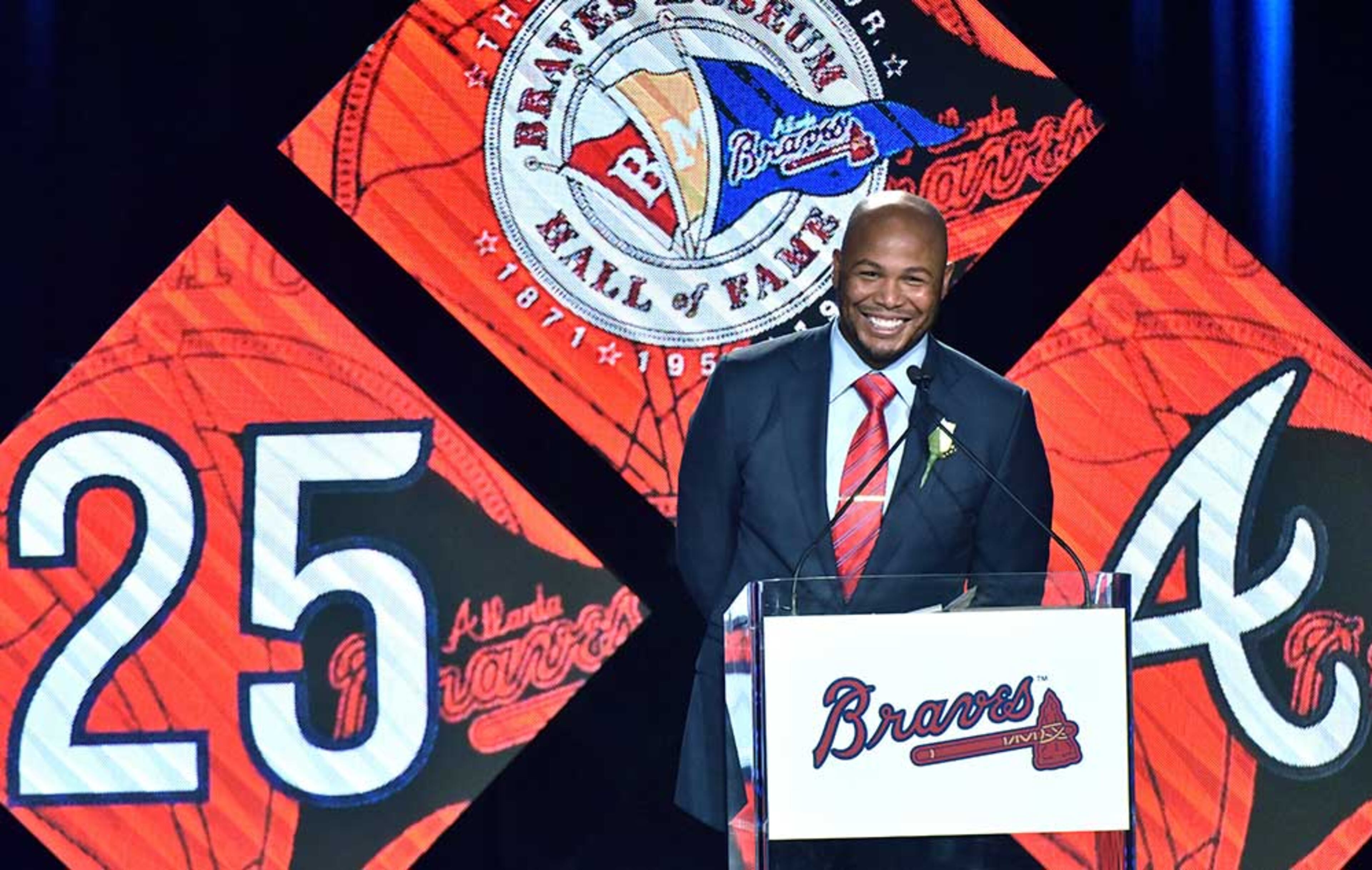 Former Atlanta Braves outfielder Andruw Jones reacts as he speaks during Braves Hall of Fame luncheon at Hyatt Regency on Friday, August 19, 2016. Atlanta Braves President John Schuerholz and former outfielder Andruw Jones were inducted into the Braves Hall of Fame. The duo were inducted during a luncheon and honored that evening in a pregame ceremony before the Braves play the Washington Nationals.