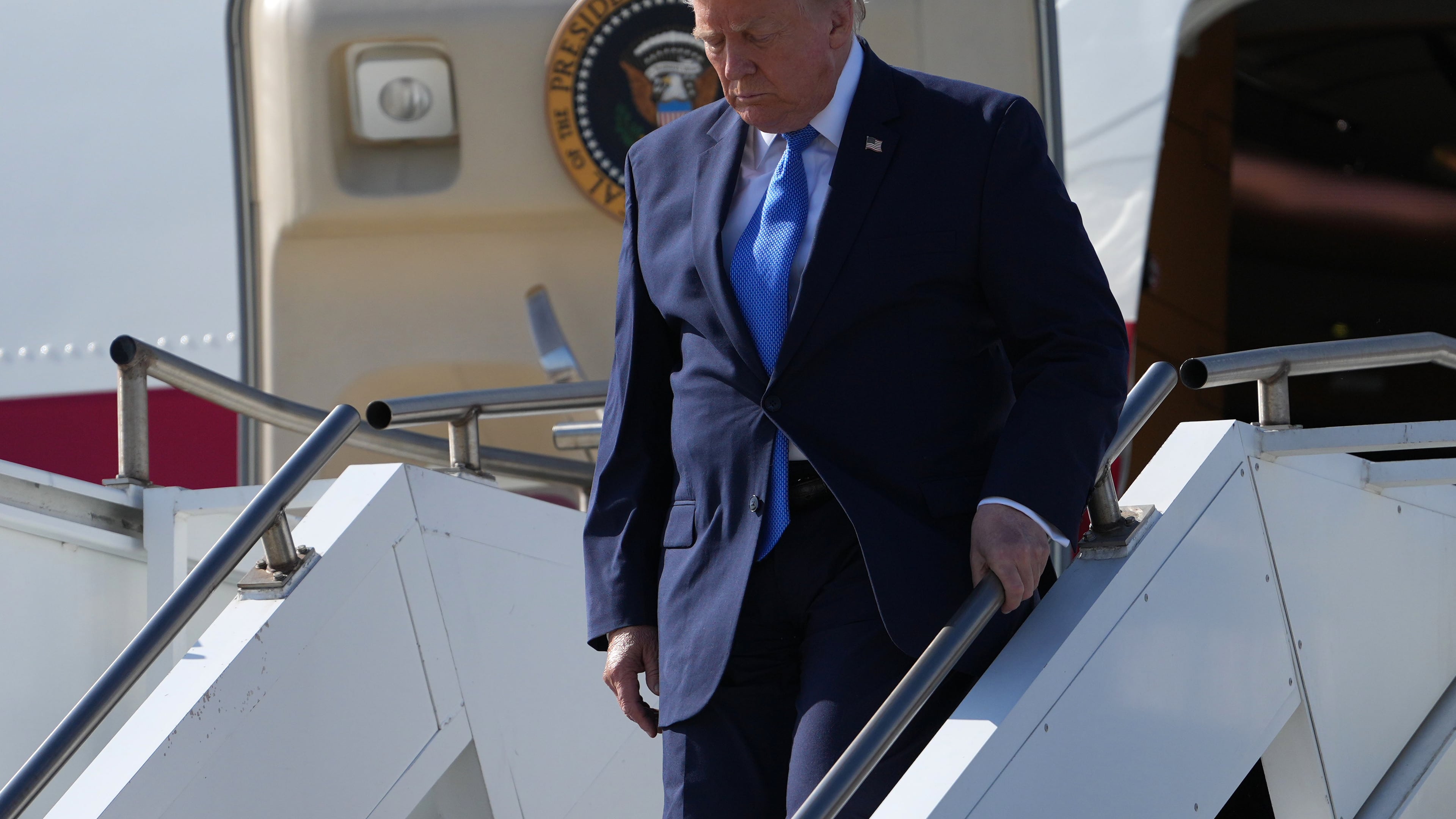President Donald Trump arrives on Air Force One, Tuesday, Aug. 4, 2026, at Los Angeles International Airport in Los Angeles. (AP Photo/Mark Schiefelbein)