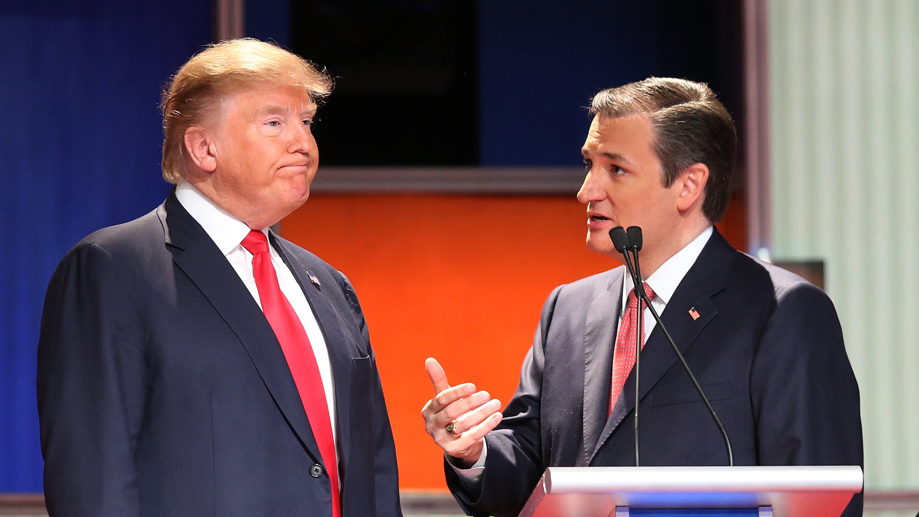 NORTH CHARLESTON, SC - JANUARY 14: Republican presidential candidates (L-R) Donald Trump and Sen. Ted Cruz (R-TX) speak during a commercial break in the Fox Business Network Republican presidential debate at the North Charleston Coliseum and Performing Arts Center on January 14, 2016 in North Charleston, South Carolina. The sixth Republican debate is held in two parts, one main debate for the top seven candidates, and another for three other candidates lower in the current polls. (Photo by Scott Olson/Getty Images)