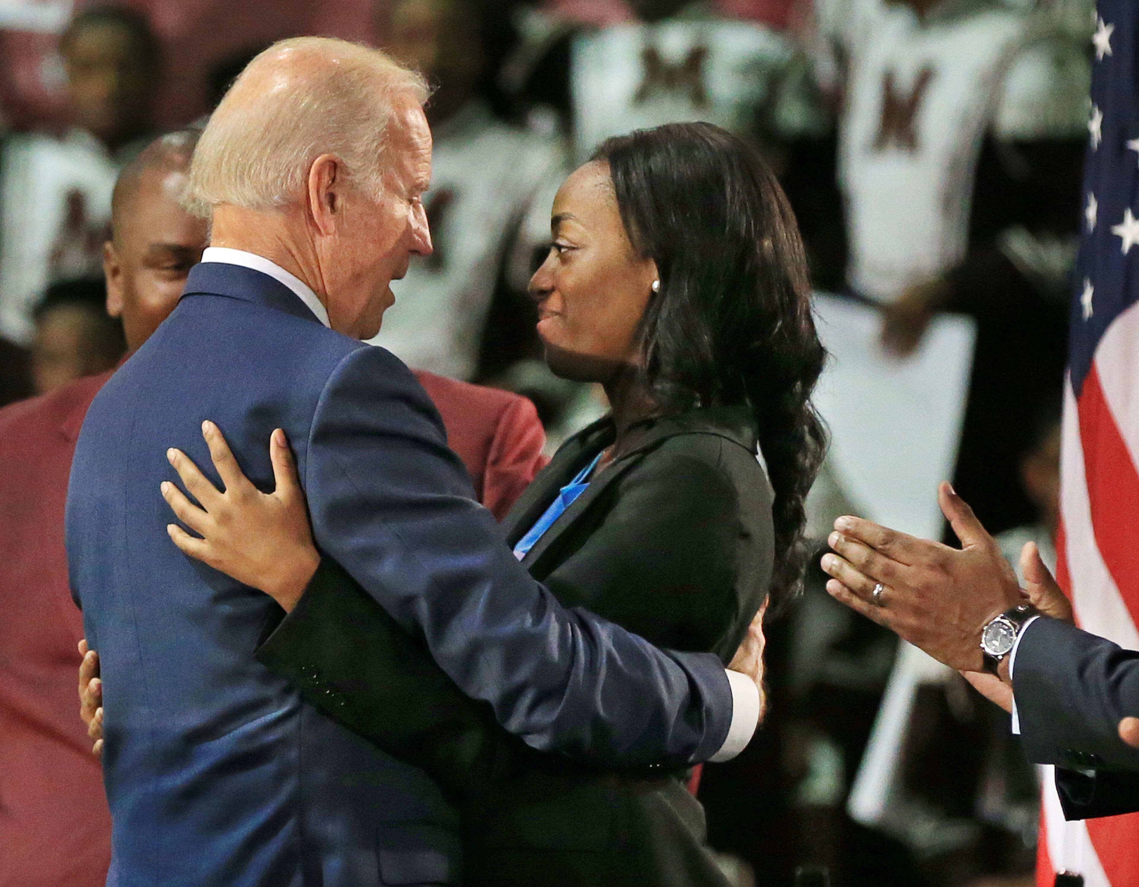 Vice President Joe Biden gets a hug from rape victim VenKayla Haynes after his speech at Morehouse College during a three-college tour to mobilize students to take action to prevent sexual assault on campuses on Tuesday, Nov. 10, 2015 in Atlanta. The tour is part of the “It’s On Us’ campaign started last year by the White House and Generation Progress to engage campus communities in preventing sexual assaults. Haynes, who also spoke at the event, said she was a young rape victim. Curtis Compton / ccompton@ajc.com