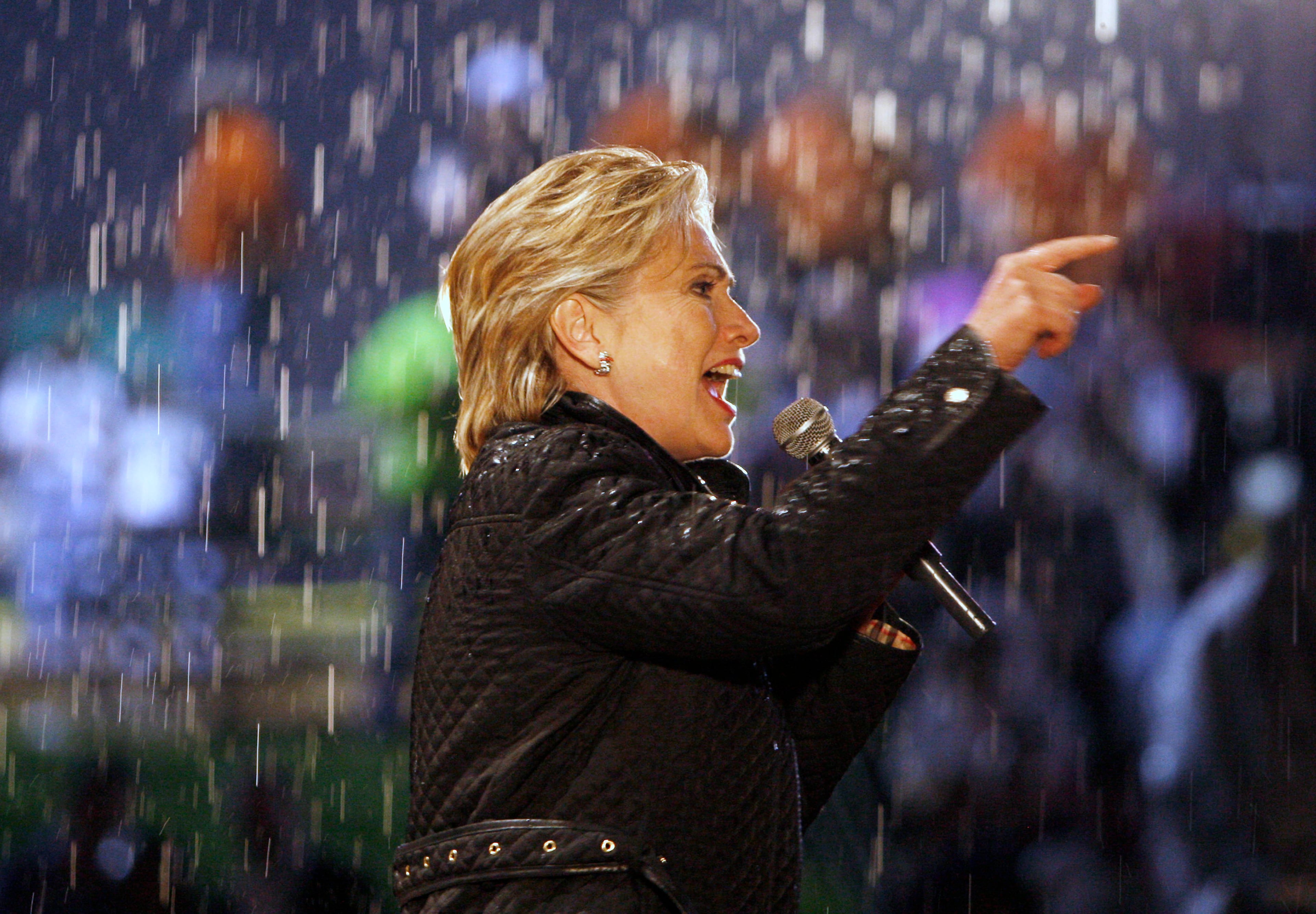 In this Saturday, April 19, 2008 file photo, then-Democratic presidential hopeful, Sen. Hillary Clinton, D-N.Y., speaks in the rain as she campaigns in McKeesport, Pa. (AP Photo/Charles Dharapak)