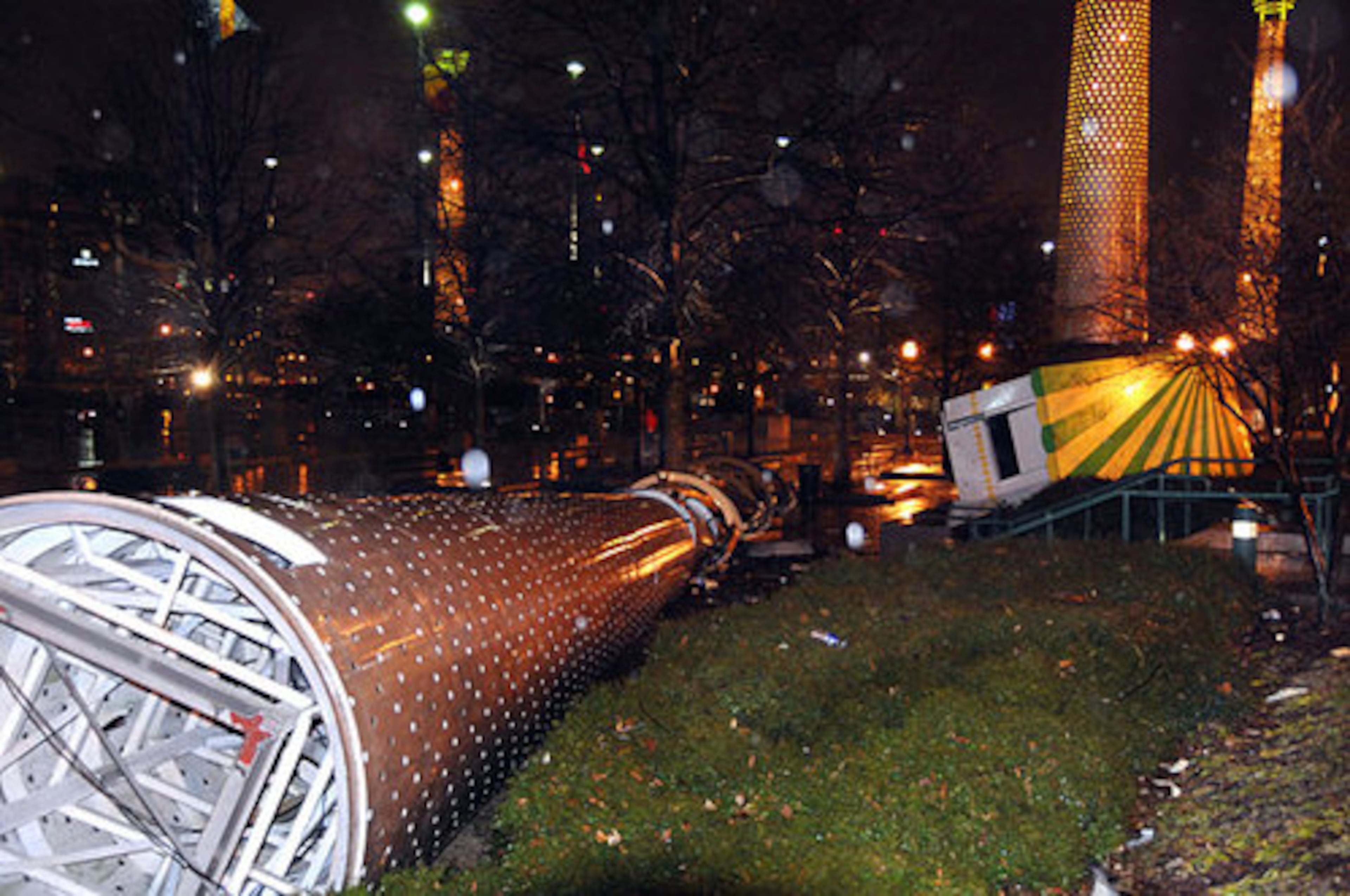 Friday, March 14: One of the large decorative lights surrounding Centennial Olympic Park is blown over and destroyed. Downtown Atlanta and the surrounding areas were hit by a storm and tornado. Witnesses said it was like a train going down Marietta Street, which fronts CNN Center. Property damage was extensive.