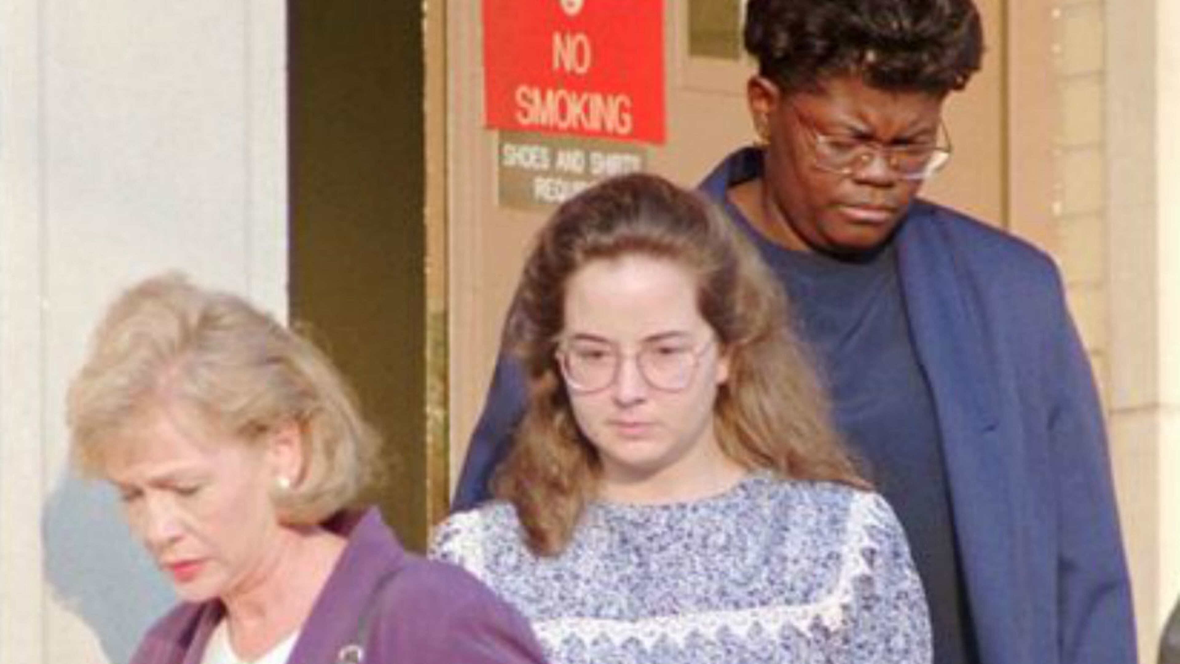 Susan Smith center is escorted from the Union County Courthouse in Union S C on Tuesday July 11 1995 A judge ruled Tuesday that she was competent to stand trial for the murder of her two sons Alex and Micahel Jury selection also began for the trial which is expected to run up to six weeks in length (AP Photo Dave Martin)