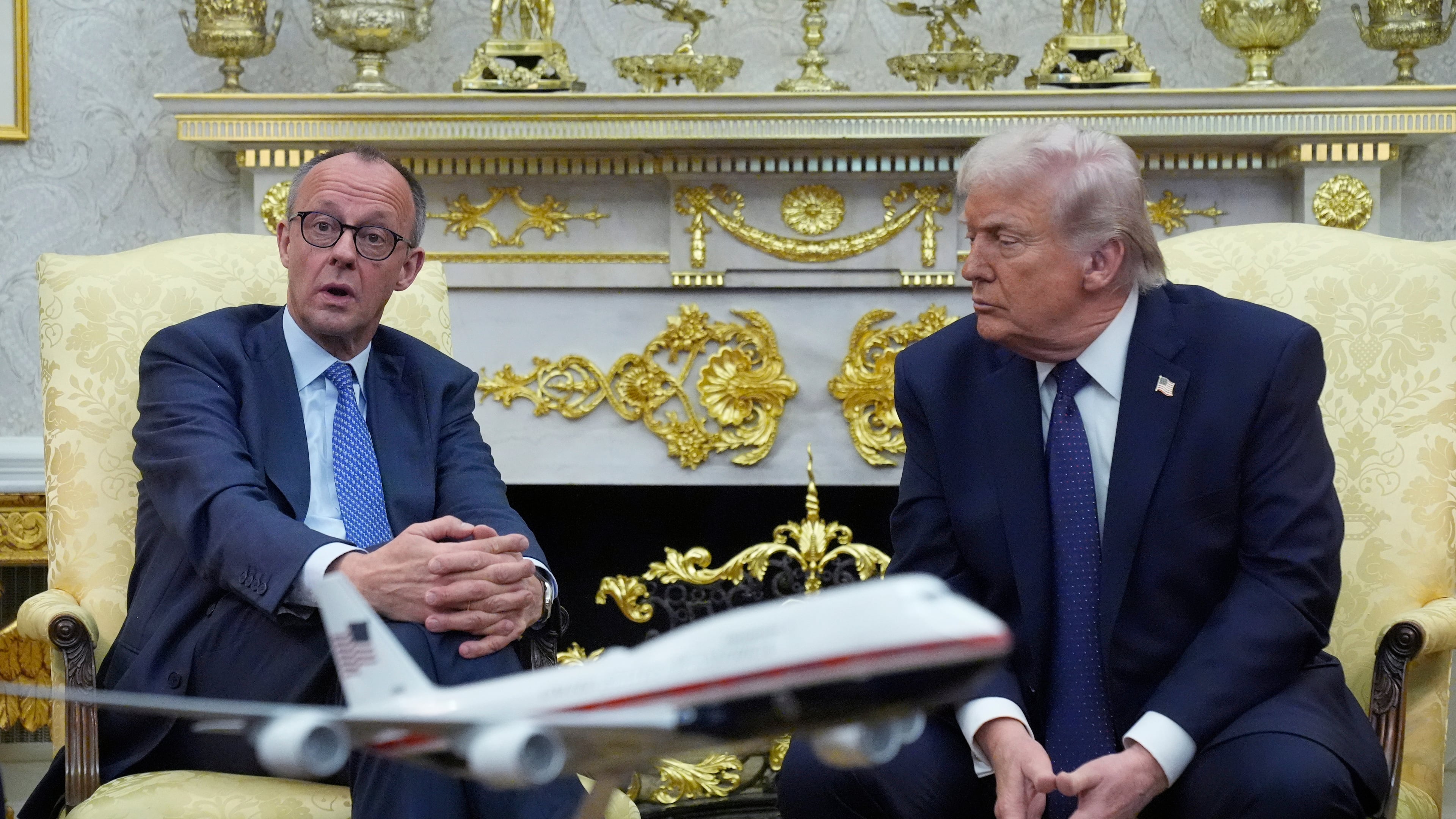 FILE - President Donald Trump meets with German Chancellor Friedrich Merz in the Oval Office at the White House, March 3, 2026, in Washington. (AP Photo/Mark Schiefelbein, File)