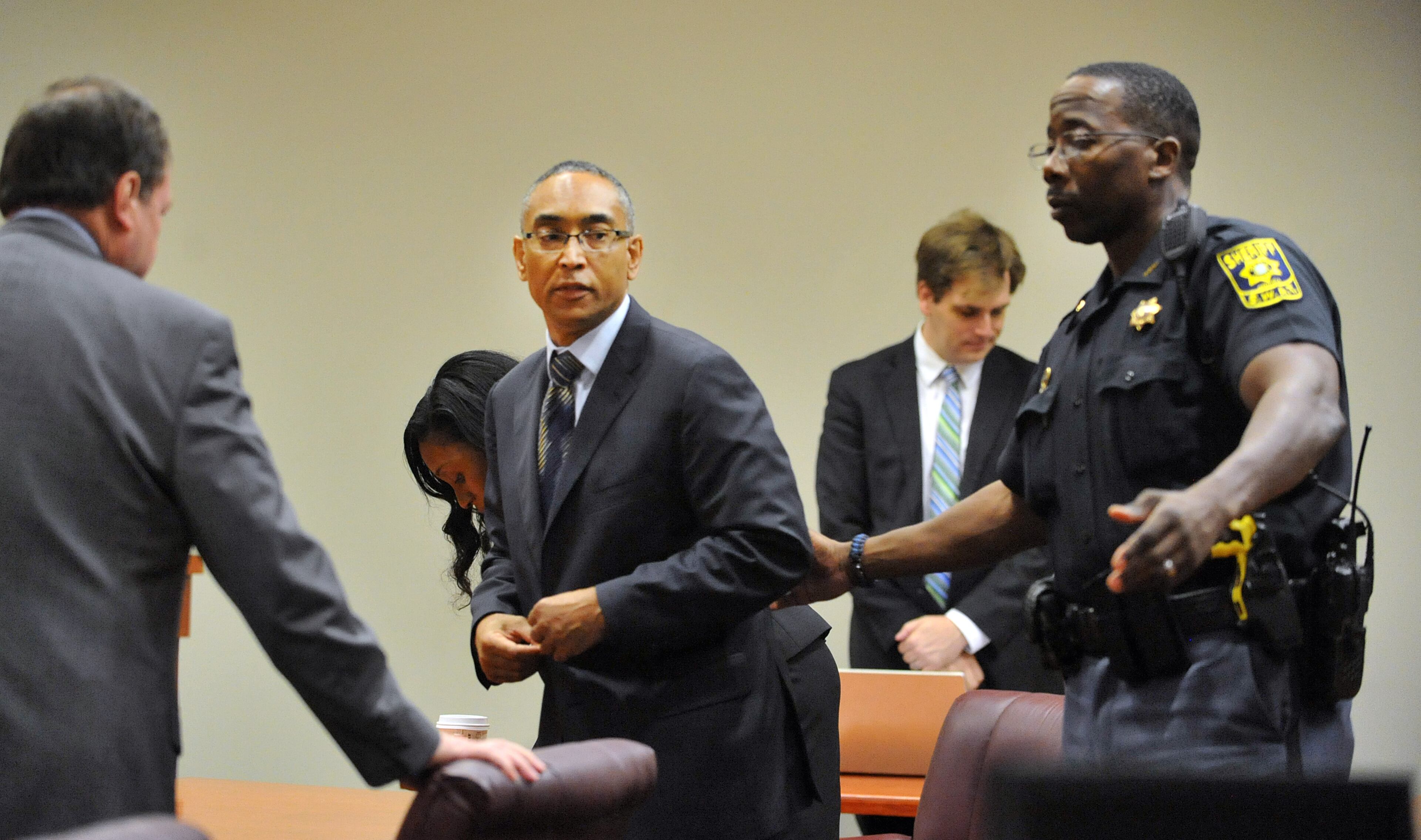 DeKalb CEO Burrell Ellis is led out of the courtroom after he was found guilty on 4 counts in his retrial before Superior Court Judge Courtney Johnson Wednesday, July 1, 2015.