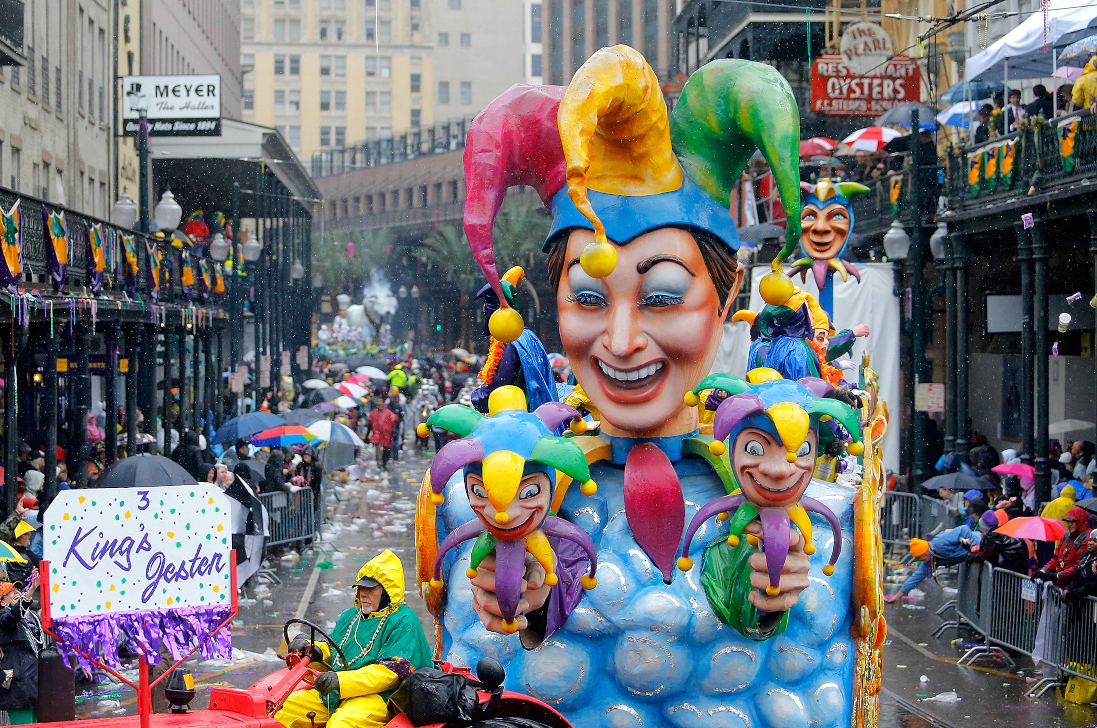 The King's Jester float makes its way toward the Canal Street turn on during a Mardi Gras parade, Tuesday, March 4, 2014, in New Orleans. (AP Photo/NOLA.com The Times-Picayune, David Grunfeld) MAGS OUT; NO SALES; USA TODAY OUT; THE BATON ROUGE ADVOCATE OUT