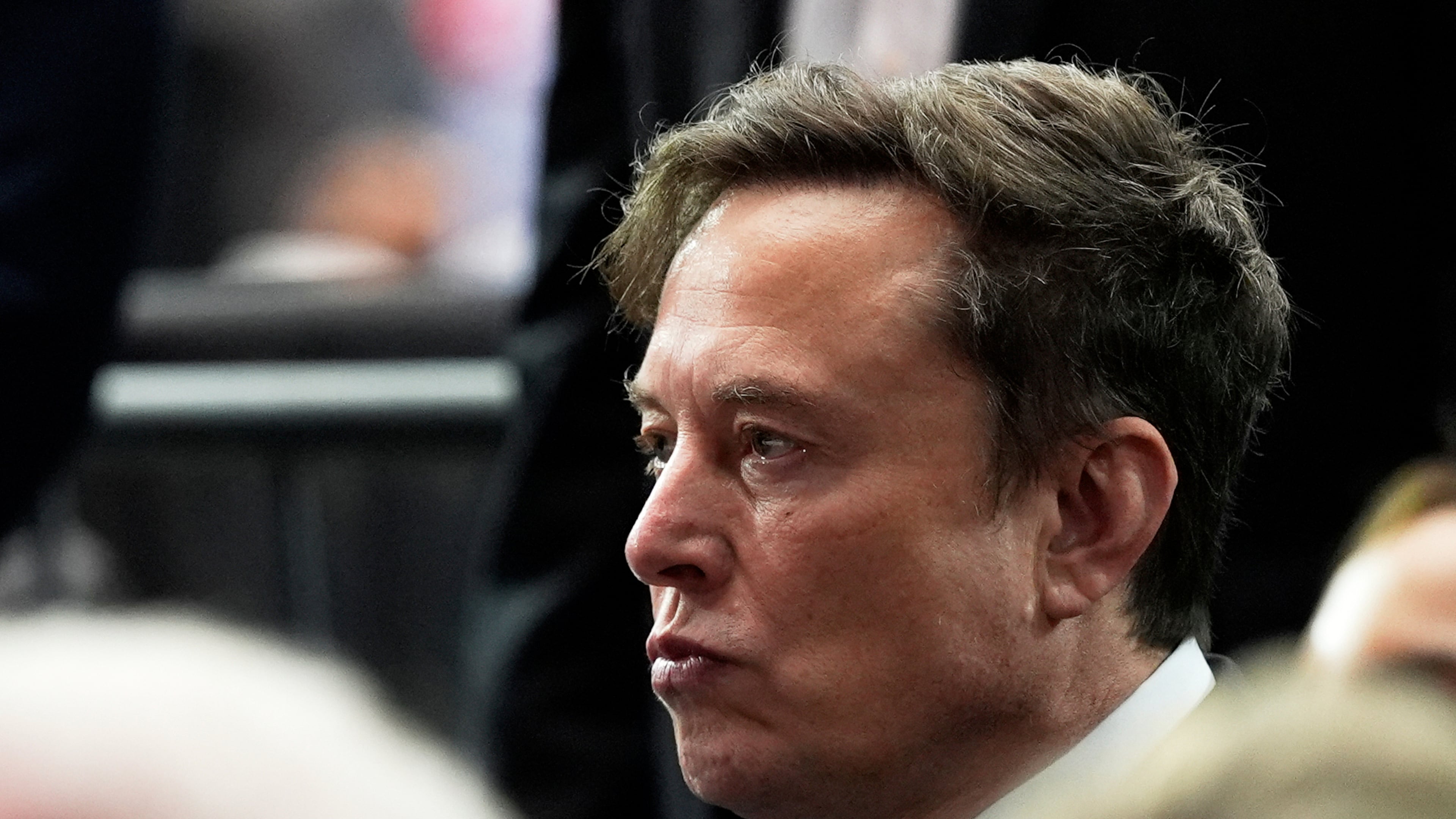 FILE - Elon Musk attends a memorial for conservative activist Charlie Kirk, Sunday, Sept. 21, 2025, at State Farm Stadium in Glendale, Ariz. (AP Photo/Julia Demaree Nikhinson, File)