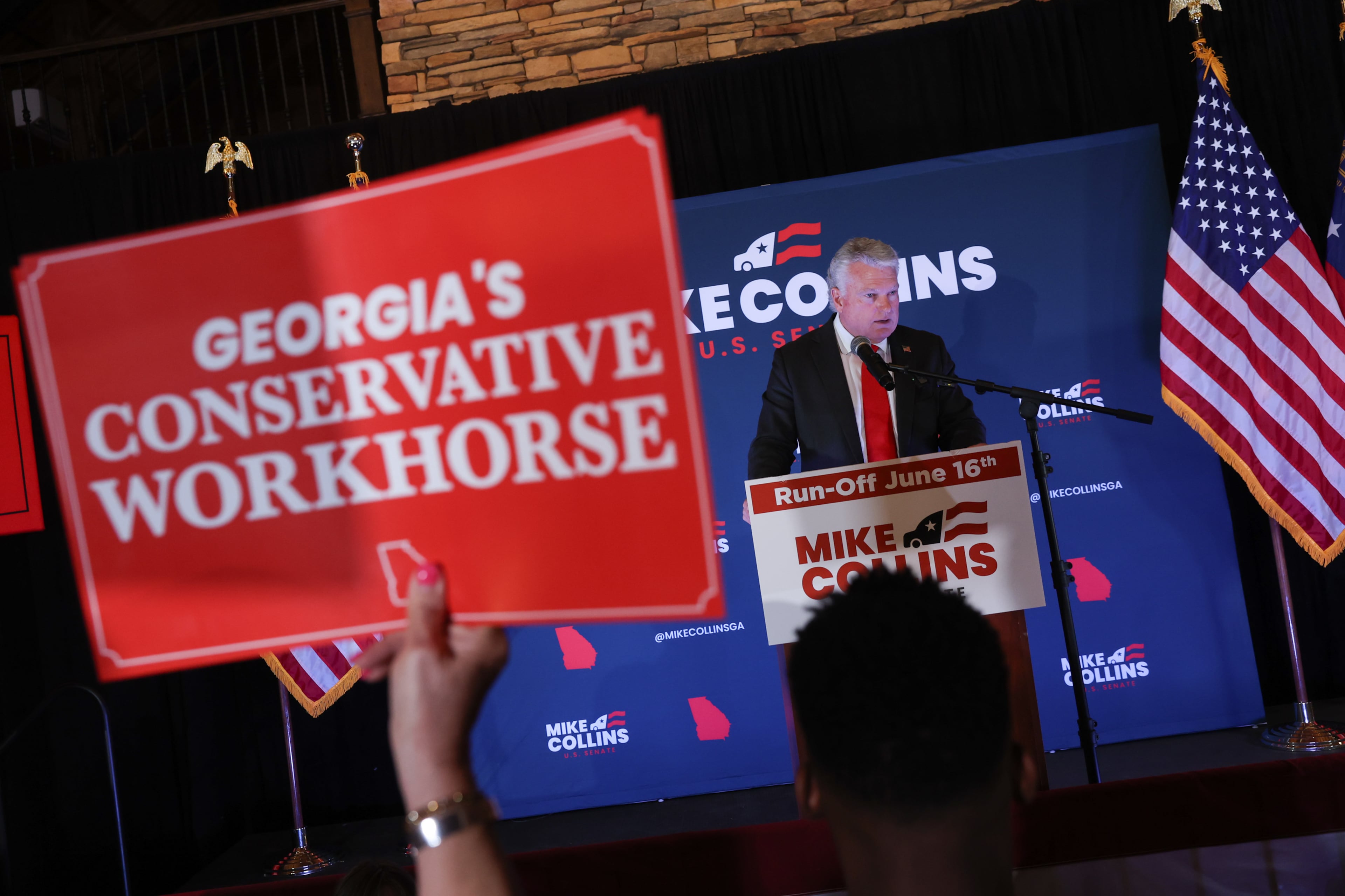 Republican U.S. Senate candidate Mike Collins speaks at his primary election watch party at The Carmichael House in Jackson on May 19, 2026. Collins, who in his second term in the U.S. House representing the 10th Congressional District, advanced to the June 16 runoff that will determine which Republican will face incumbent Democratic Sen. Jon Ossoff. (Arvin Temkar/AJC)
