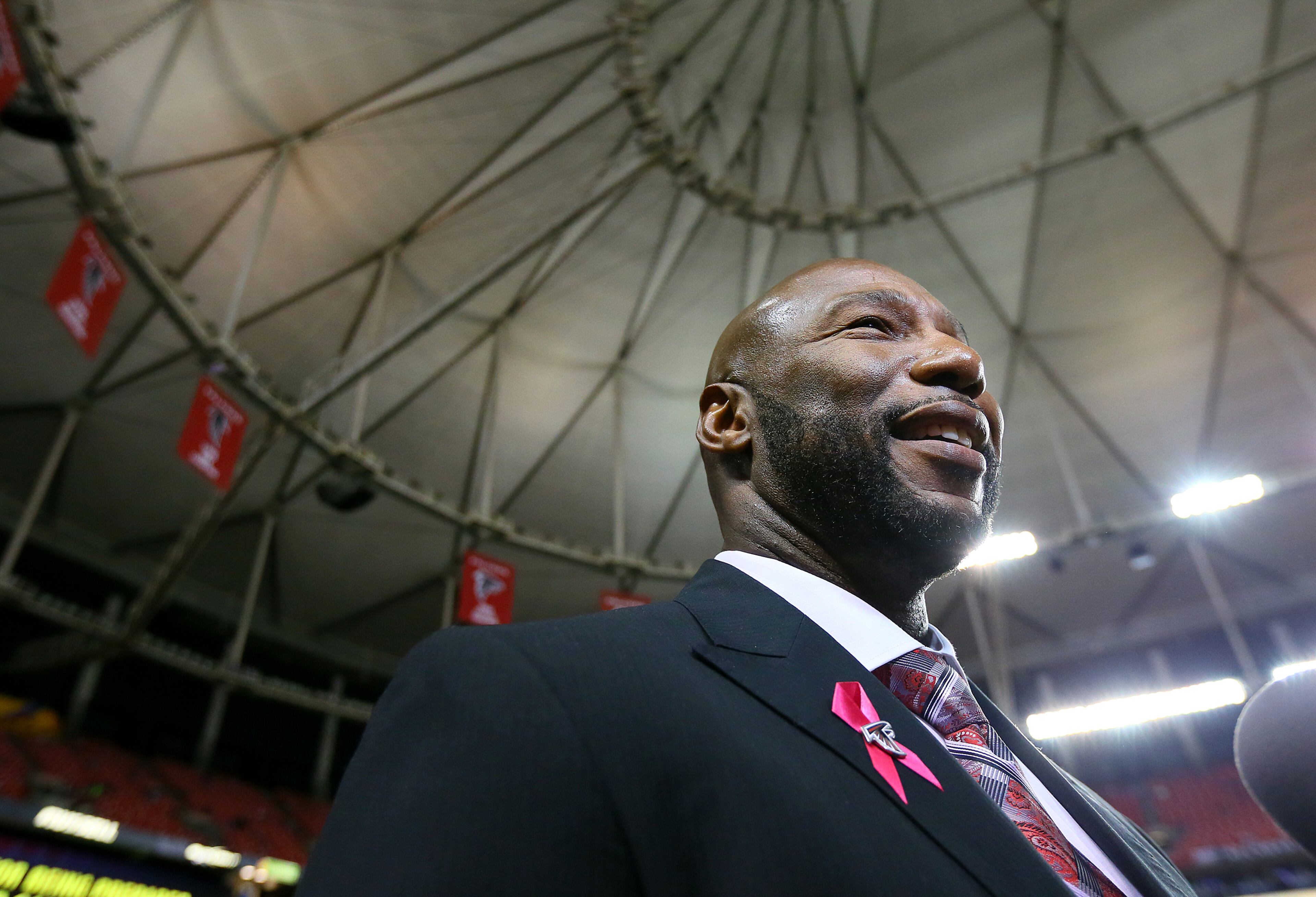 Gerald Riggs takes the field before being inducted into the Falcons' Ring of Honor on Monday, Oct. 7, 2013, in Atlanta. CURTIS COMPTON / CCOMPTON@AJC.COM
