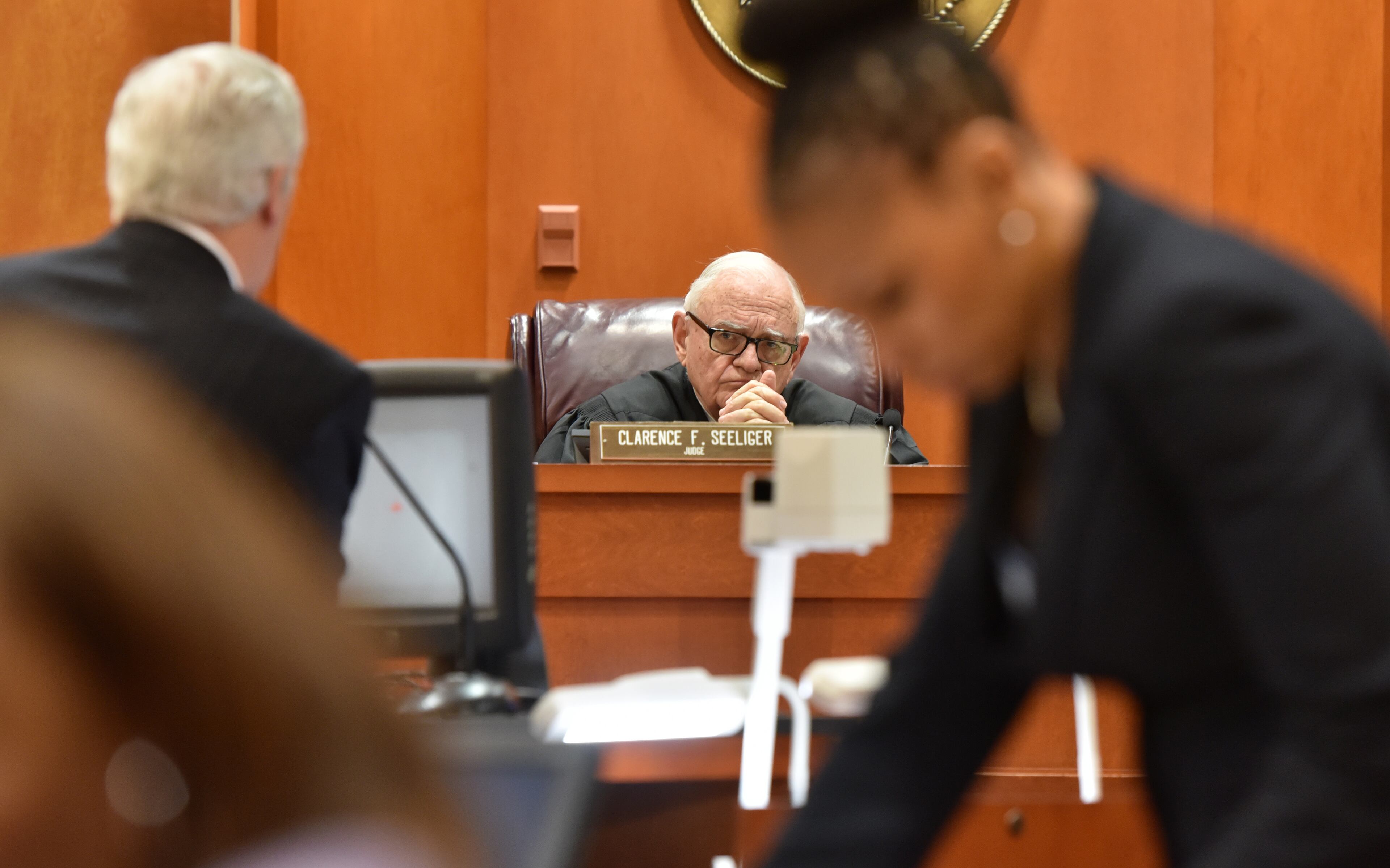 Feb. 18, 2016 Decatur, GA: DeKalb County Superior Court Judge Clarence Seeliger listens to an objection from defense attorney William Mckenna, left. Prosecutor Buffy Williams is pictured on the right. (UPDATE: On Friday, Feb. 26, Robinson was found guilty on six counts but avoided conviction on the most serious charges.) BRANT SANDERLIN/BSANDERLIN@AJC.COM