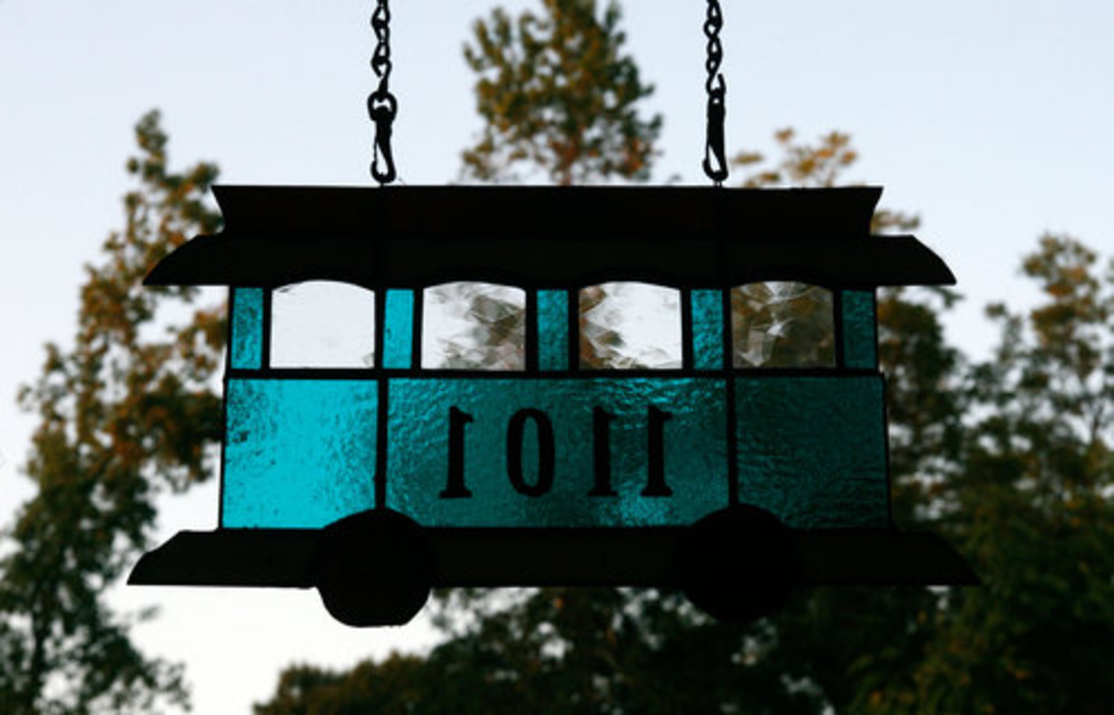 A stained glass trolley, representing the South Atlantans for Neighborhood Development hangs in front of the Bolognese/McCord home. SAND is an organization of seven contiguous neighborhoods and is active in working to improve those areas. One major fundraiser is its Tour of Homes which will be Oct. 18-19.
