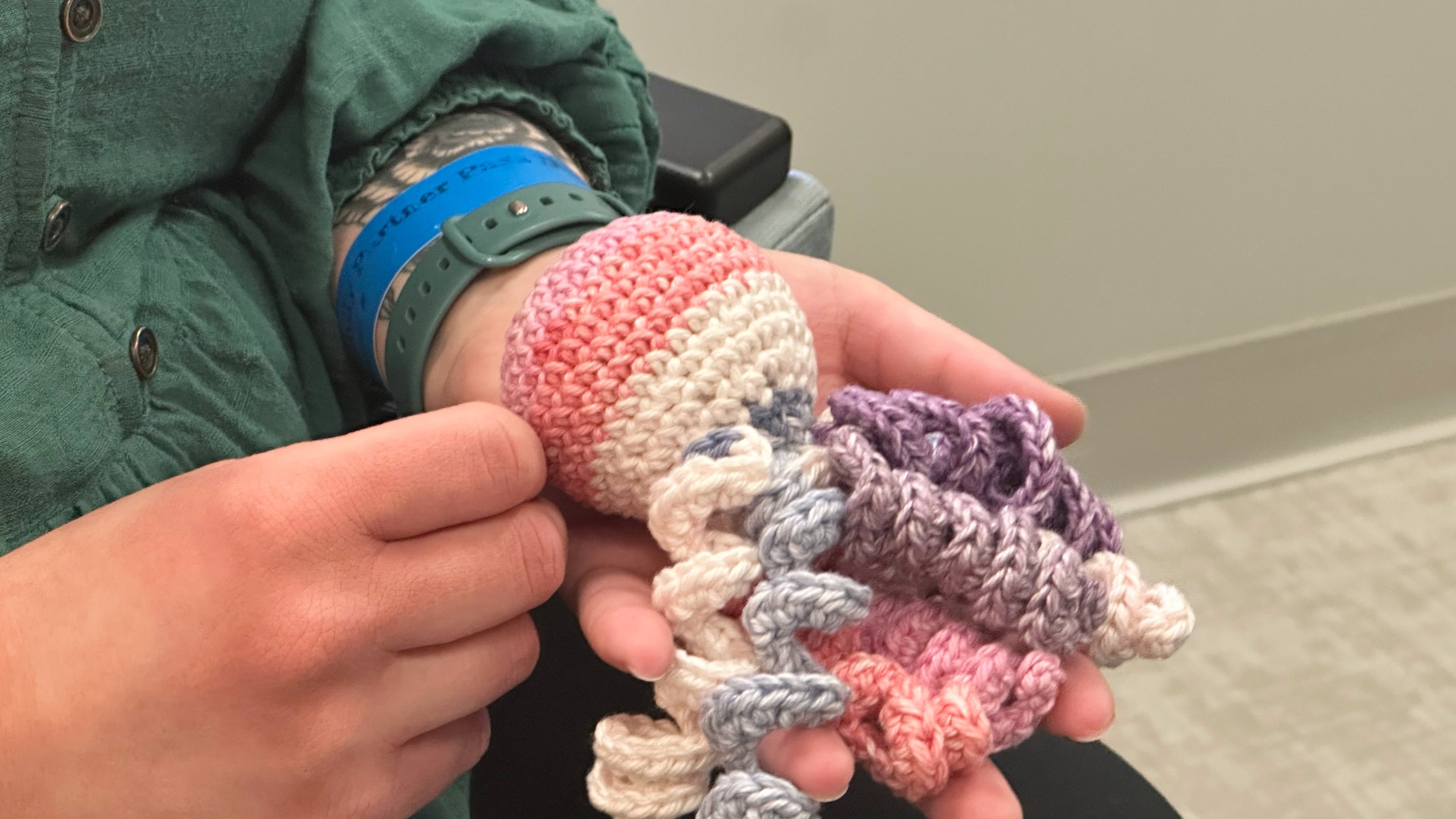 Joelle Haley holds amigurumi octopi at the Children's Hospital of Michigan Neonatal Intensive Care Unit at DMC Hutzel Women's Hospital in Detroit, Thursday, Feb. 26, 2026. (AP Photo/Corey Williams)