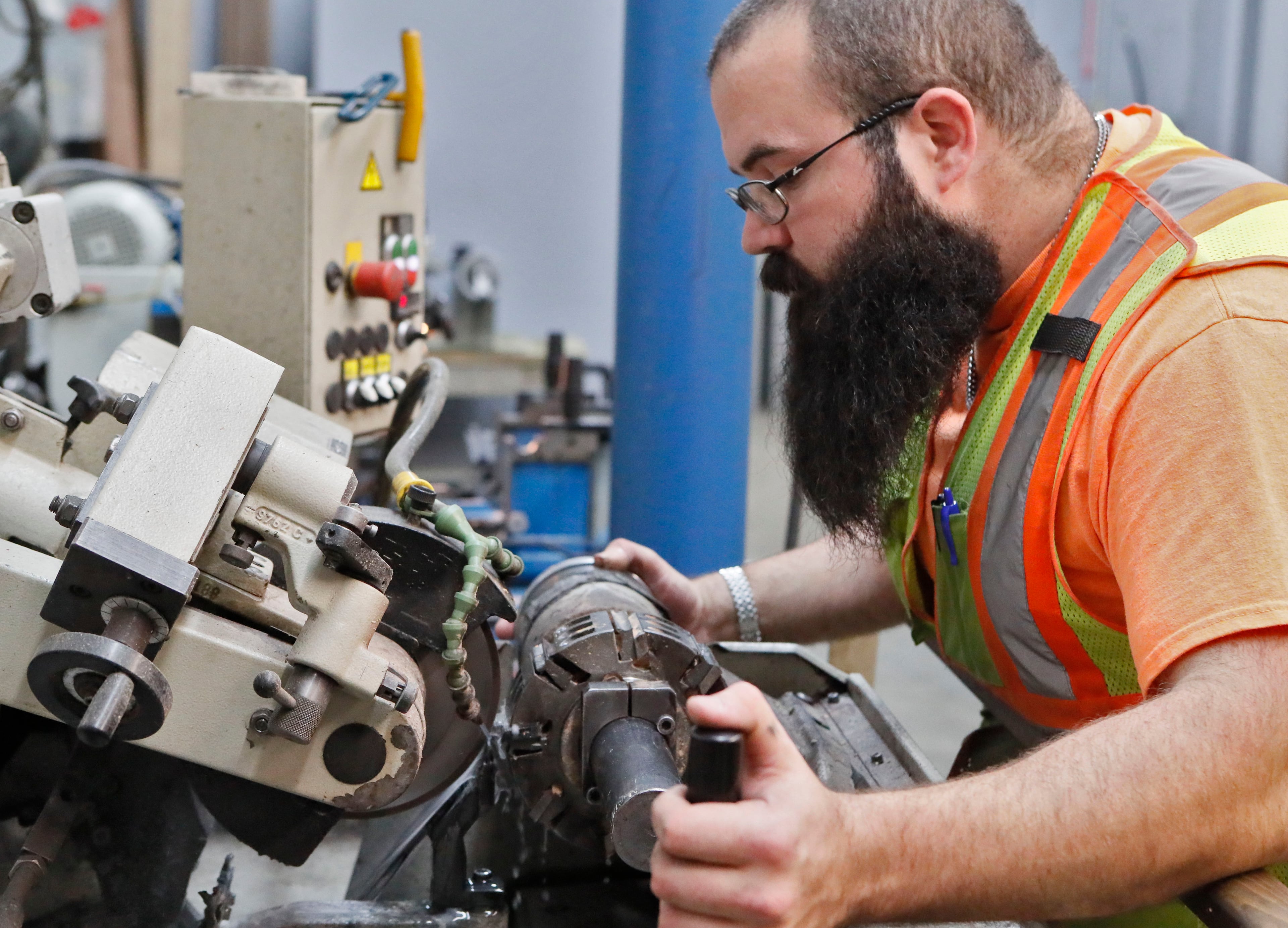 November 14, 2019 - Cleveland, GA - An employee sharpens and sets up a molding cutter head for a run of molding. Jim Howard's Atlanta family business of buying and selling hardwood grew since the Great Recession on the strength of exports mostly to China, whose growing middle class wanted red oak floors and white oak furniture. When the trade war resulted in 25% Chinese tariffs on American wood, Howard's growing export business fell from 25% of company income to 8% in a year. Bob Andres / robert.andres@ajc.com
