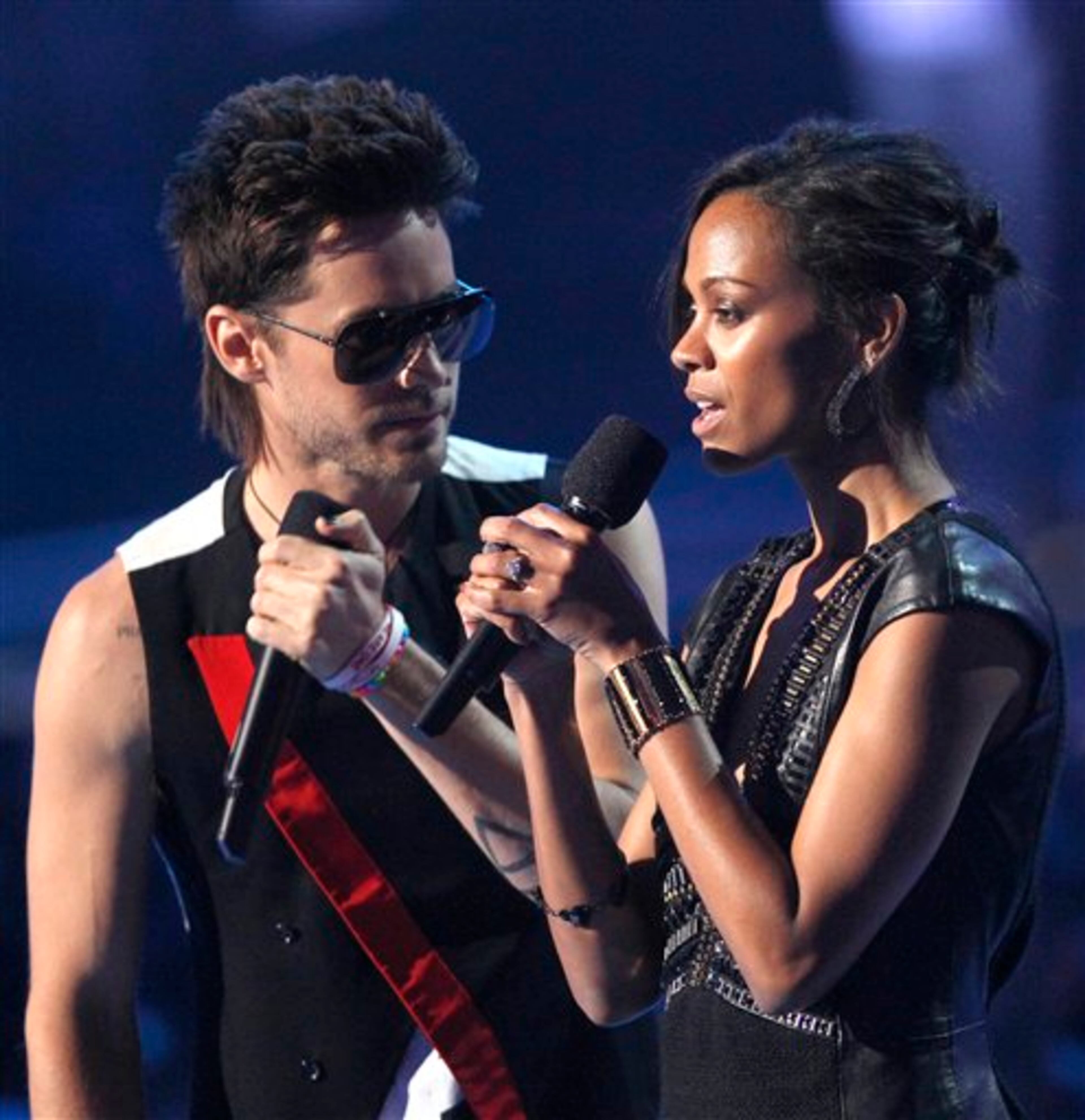Jared Leto, left, and Zoe Saldana present a performance at the MTV Video Music Awards on Sunday Aug. 28, 2011, in Los Angeles. (AP Photo/Matt Sayles)