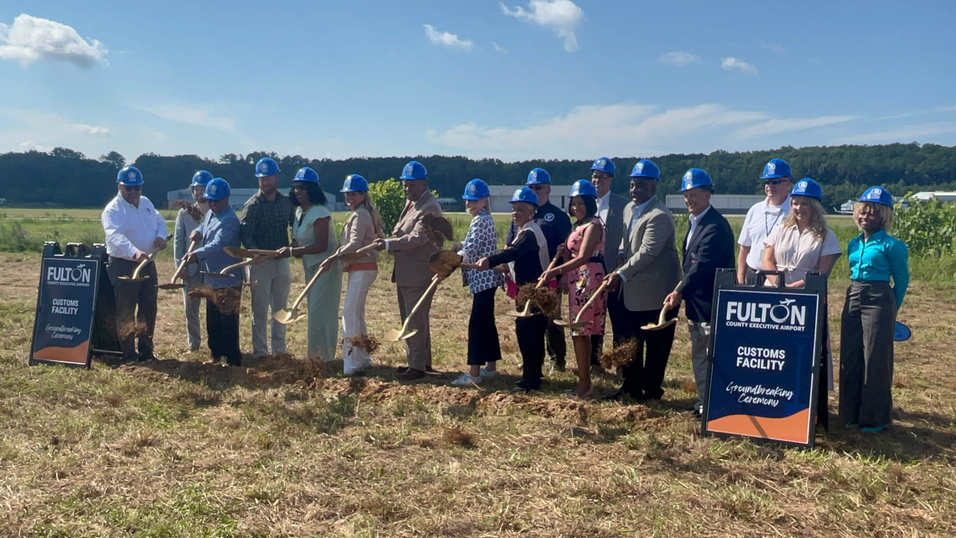 Fulton County officials gathered for a groundbreaking ceremony for a customs facility at Fulton County Executive Airport. (Carson Bonner/AJC)