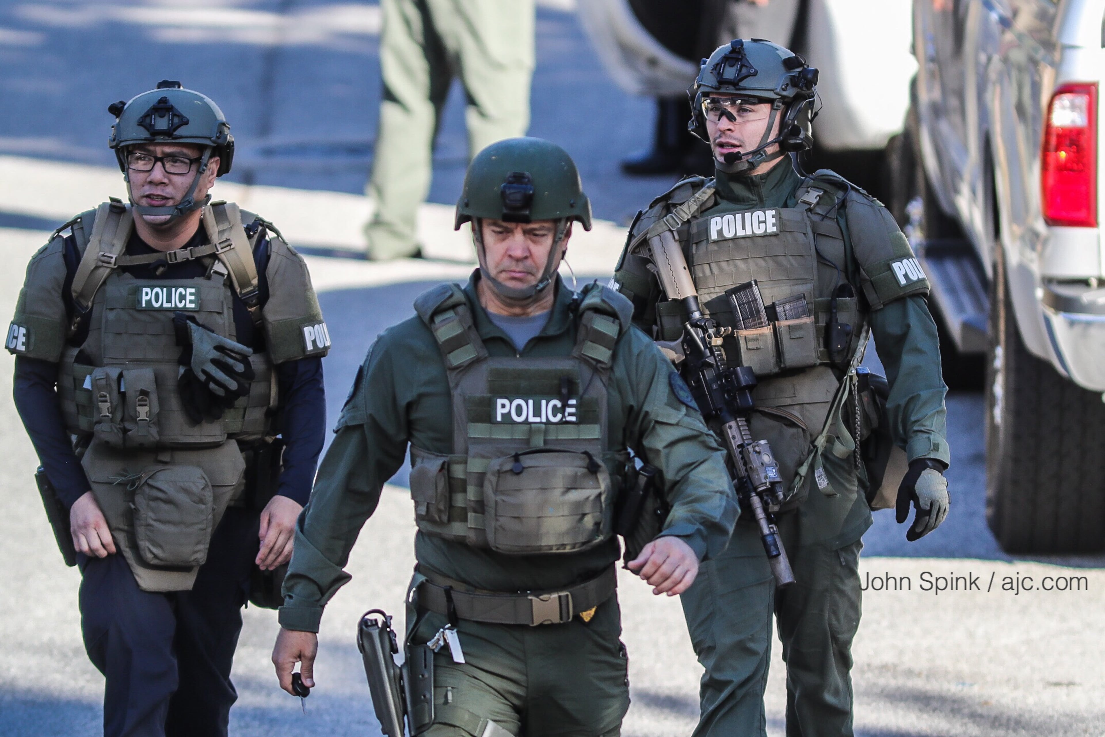 A SWAT team was on Cordite Loop in Snellville Monday morning. JOHN SPINK / JSPINK@AJC.COM