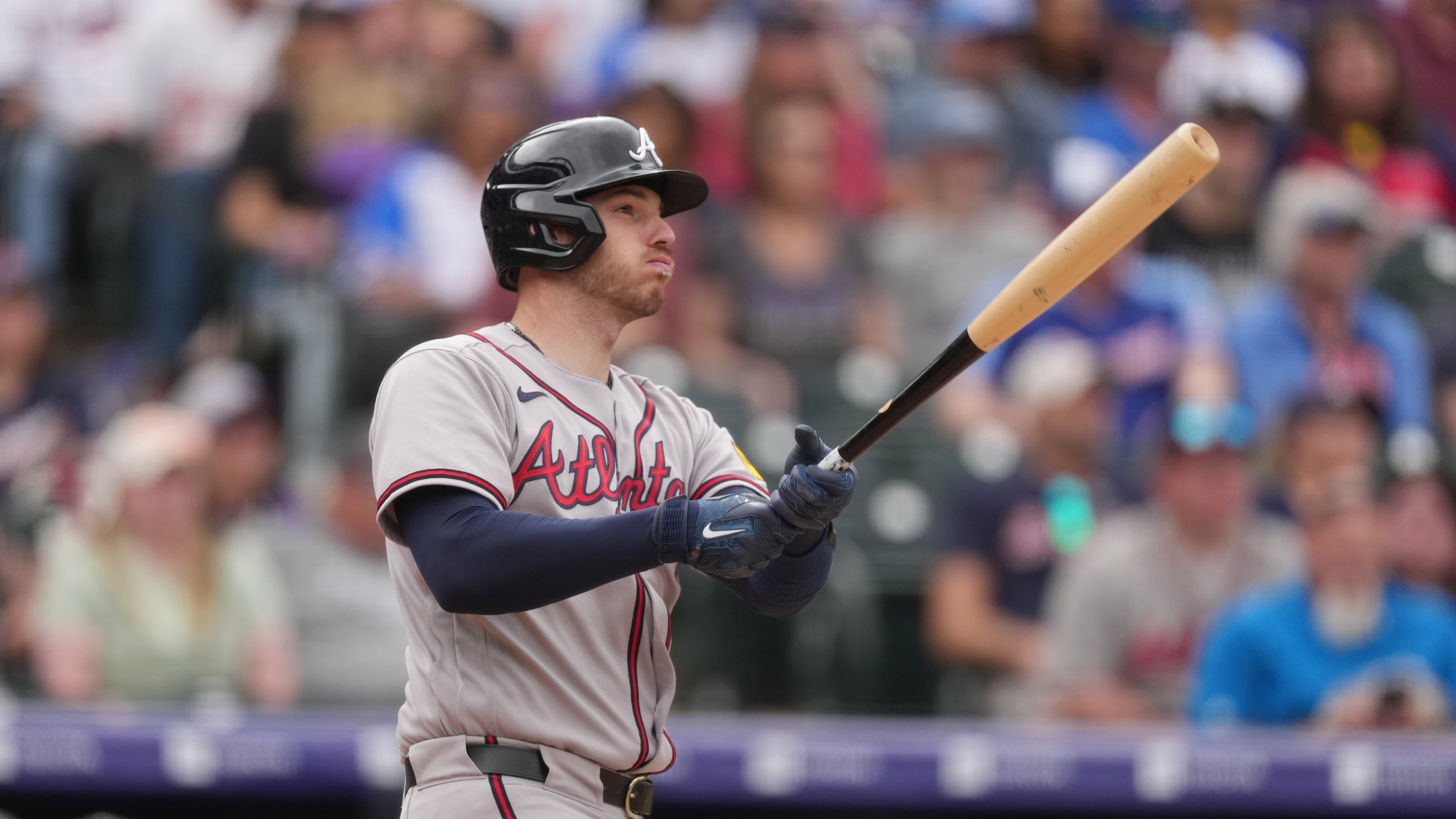 Atlanta Braves' Jonah Heim follows the flight of his double to drive in two runs off Colorado Rockies relief pitcher Jimmy Herget in the ninth inning of a baseball game, Sunday, May 3, 2026, in Denver. (AP Photo/David Zalubowski)