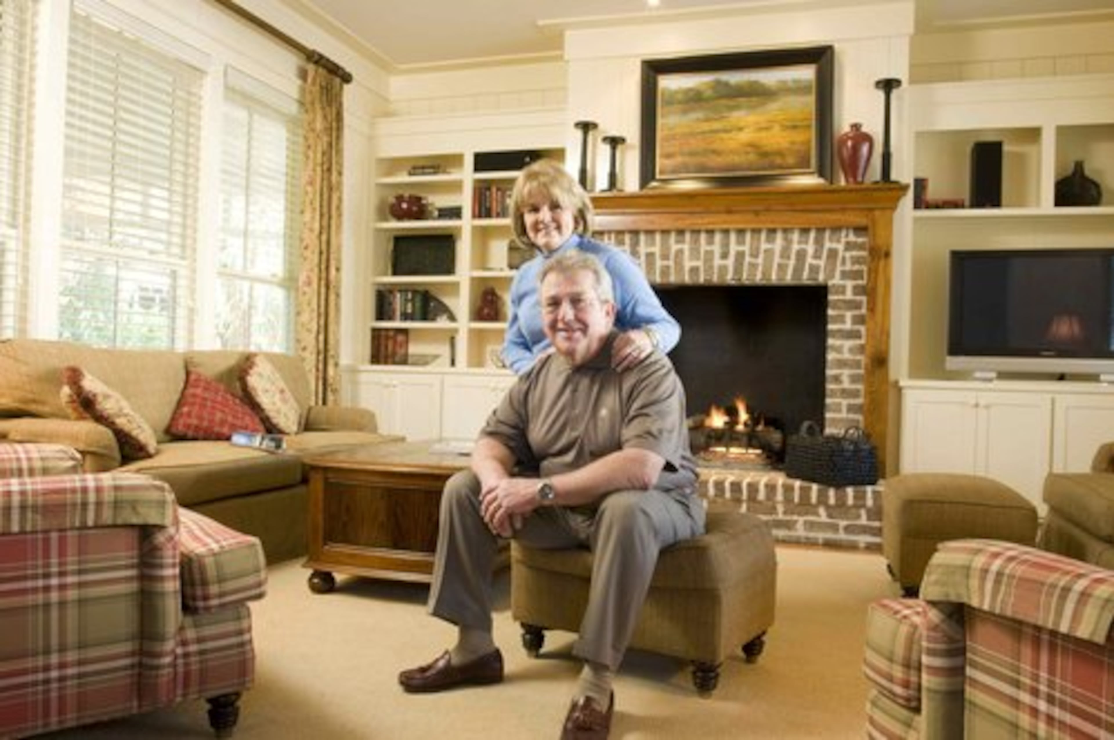 The Floyds' home, which has about 3,000 square feet, includes a fireplace and built-in bookcases. There's also a fireplace on the wraparound porch.