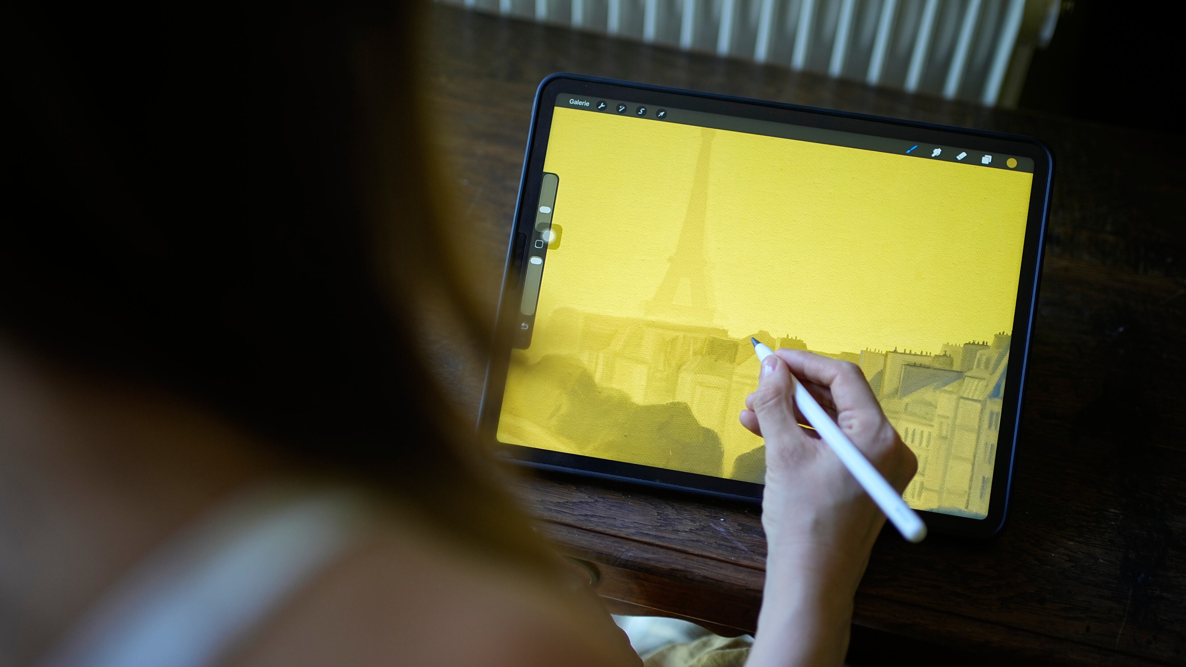 Illustrator Marina Antonova works on a drawing for her series called "Chronicles of a Heating Planet" in Beaumont-les-Valence, southern France, on Sept. 12, 2026. (AP Photo/Laurent Cipriani)
