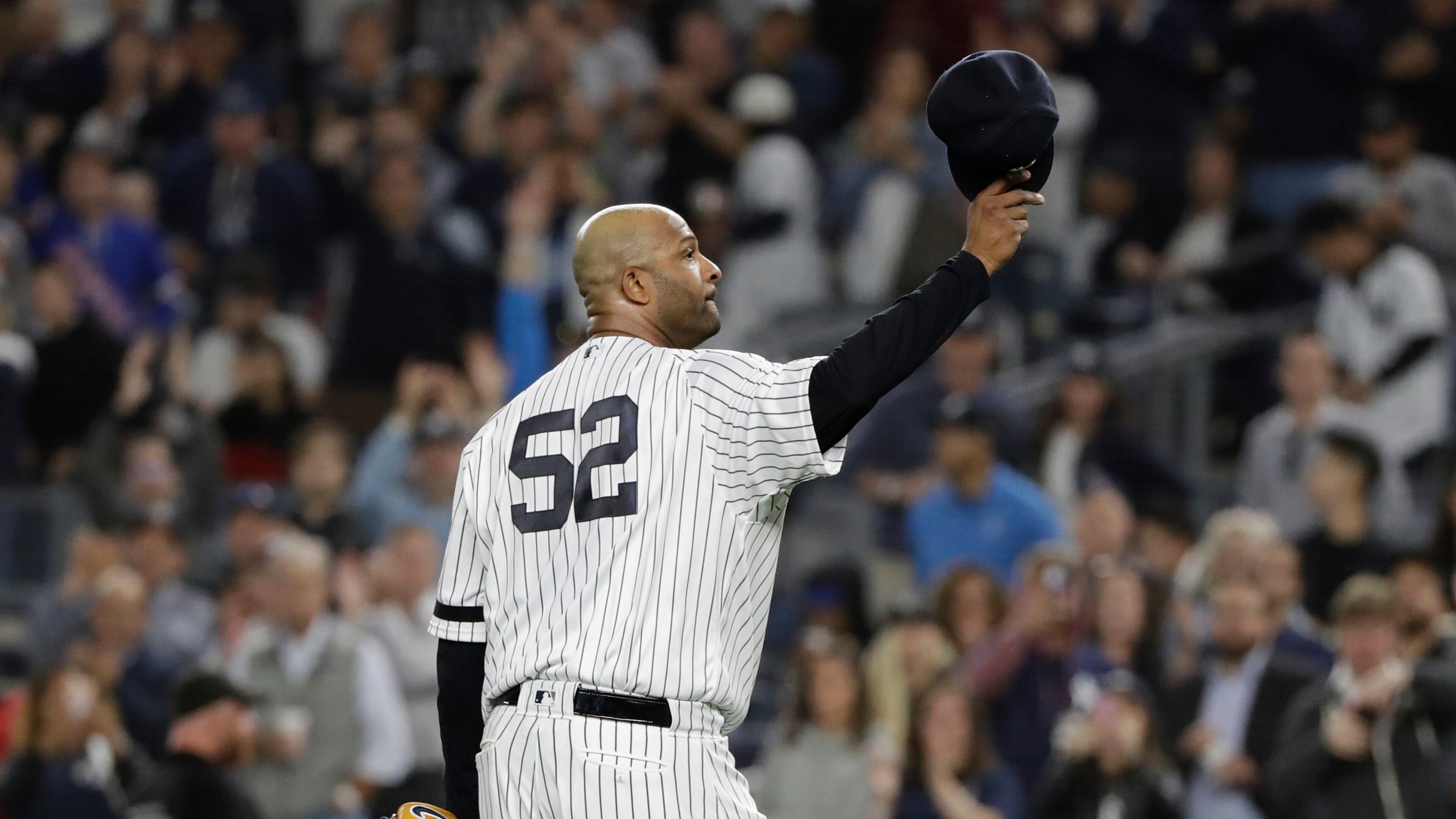 FILE - New York Yankees starting pitcher CC Sabathia gestures to fans as he leaves during the third inning of the team's baseball game against the Los Angeles Angels Sept. 18, 2019, in New York. (AP Photo/Frank Franklin II, File)