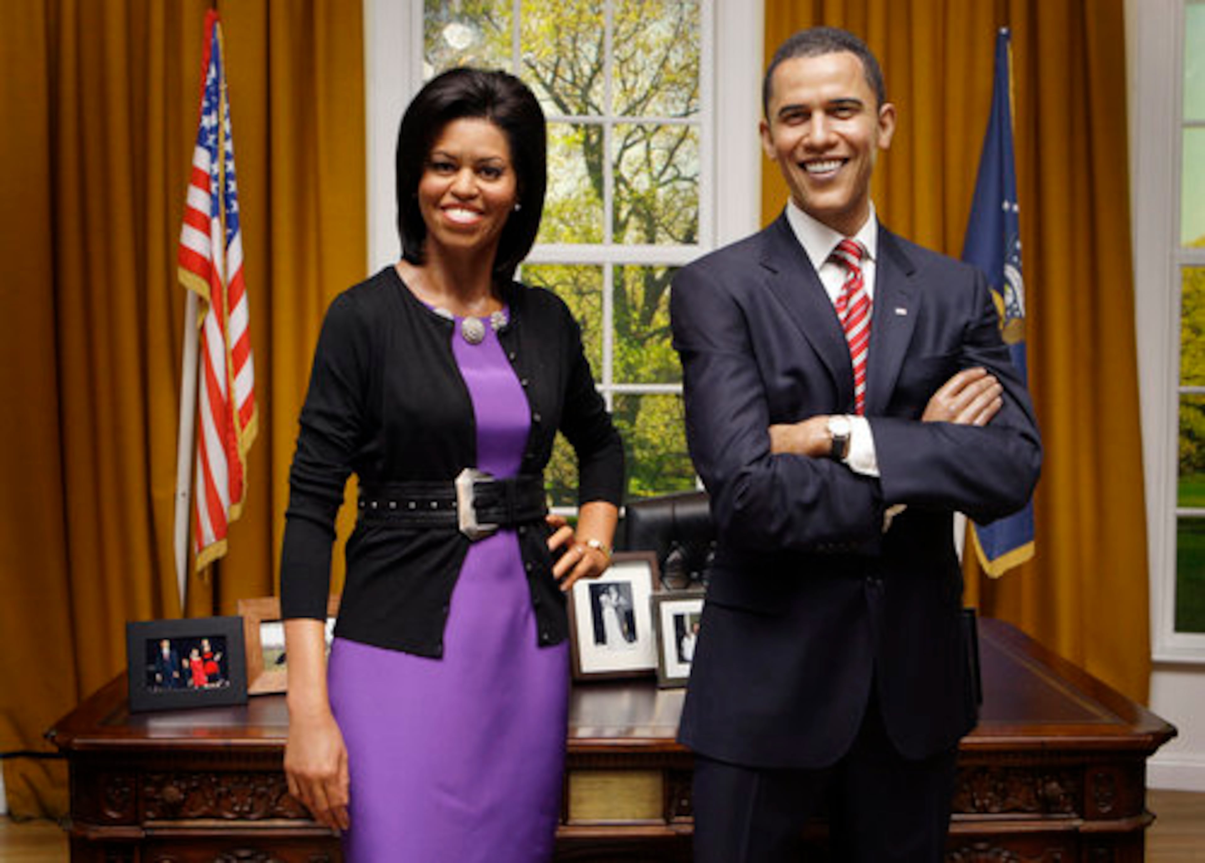 A wax figure of U.S. First Lady Michelle Obama joins that of her husband, President Barack Obama, at Madame Tussauds in London, Tuesday, Jan 19, 2010.
