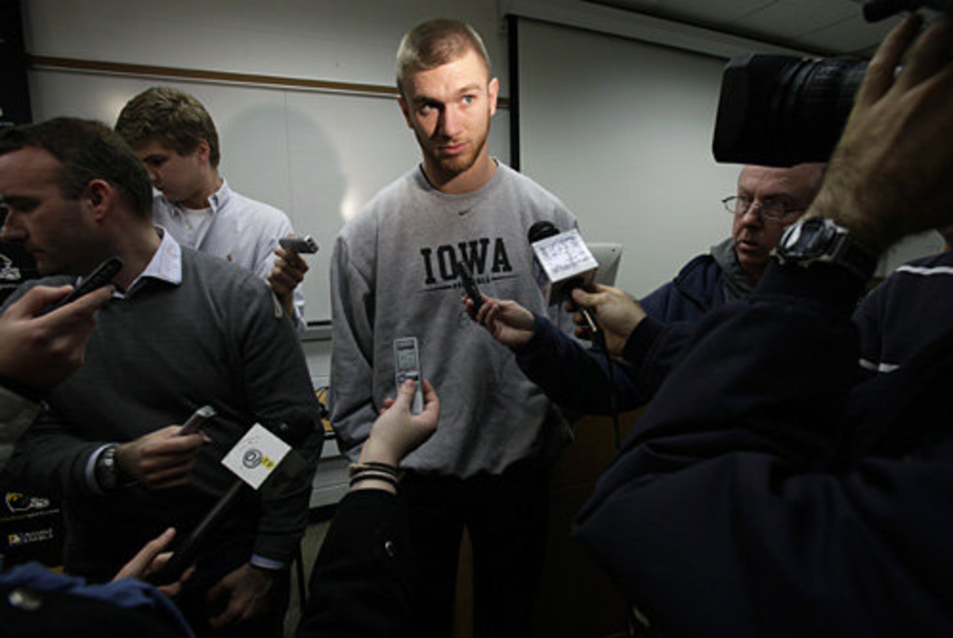 Hawkeyes QB RICKY STANZI (center) was injured late in the season but is slated to return for the Orange Bowl game. Stanzi has passed for 2,186 yards, with 15 touchdowns and 14 interceptions this season.