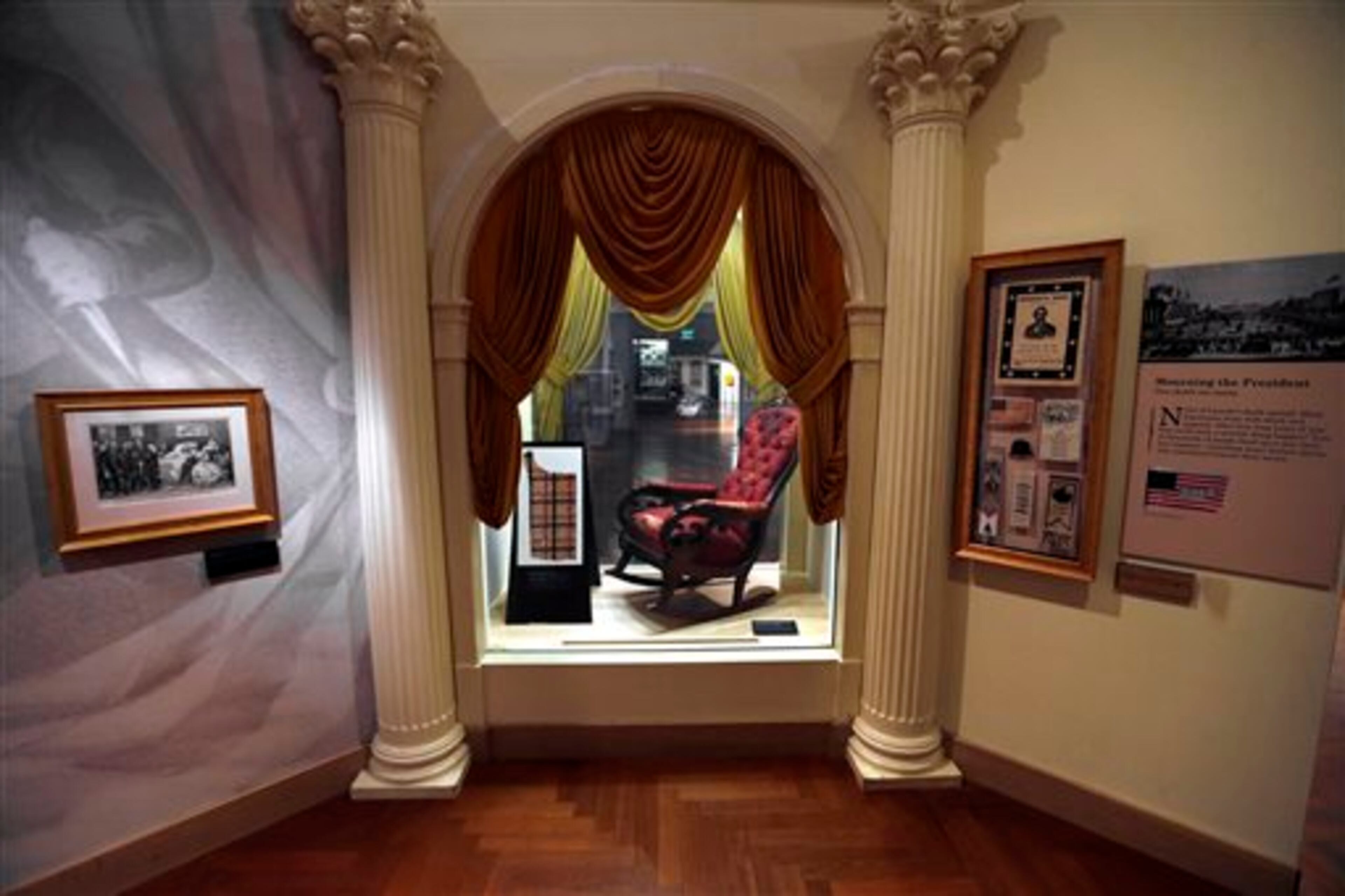 The chair in which President Abraham Lincoln was assassinated on April 14, 1865 is shown on display at the Henry Ford Museum in Dearborn, Mich., March 23, 2015. The Henry Ford Museum is offering a closer glimpse of the pivotal piece of history to mark the assassination�s 150th anniversary. The Henry Ford Museum in Dearborn will remove the chair from its glass enclosure on April 15, the sesquicentennial of Lincoln�s death. It will be displayed in a plaza area and museum admission will be free. (AP Photo/Paul Sancya)