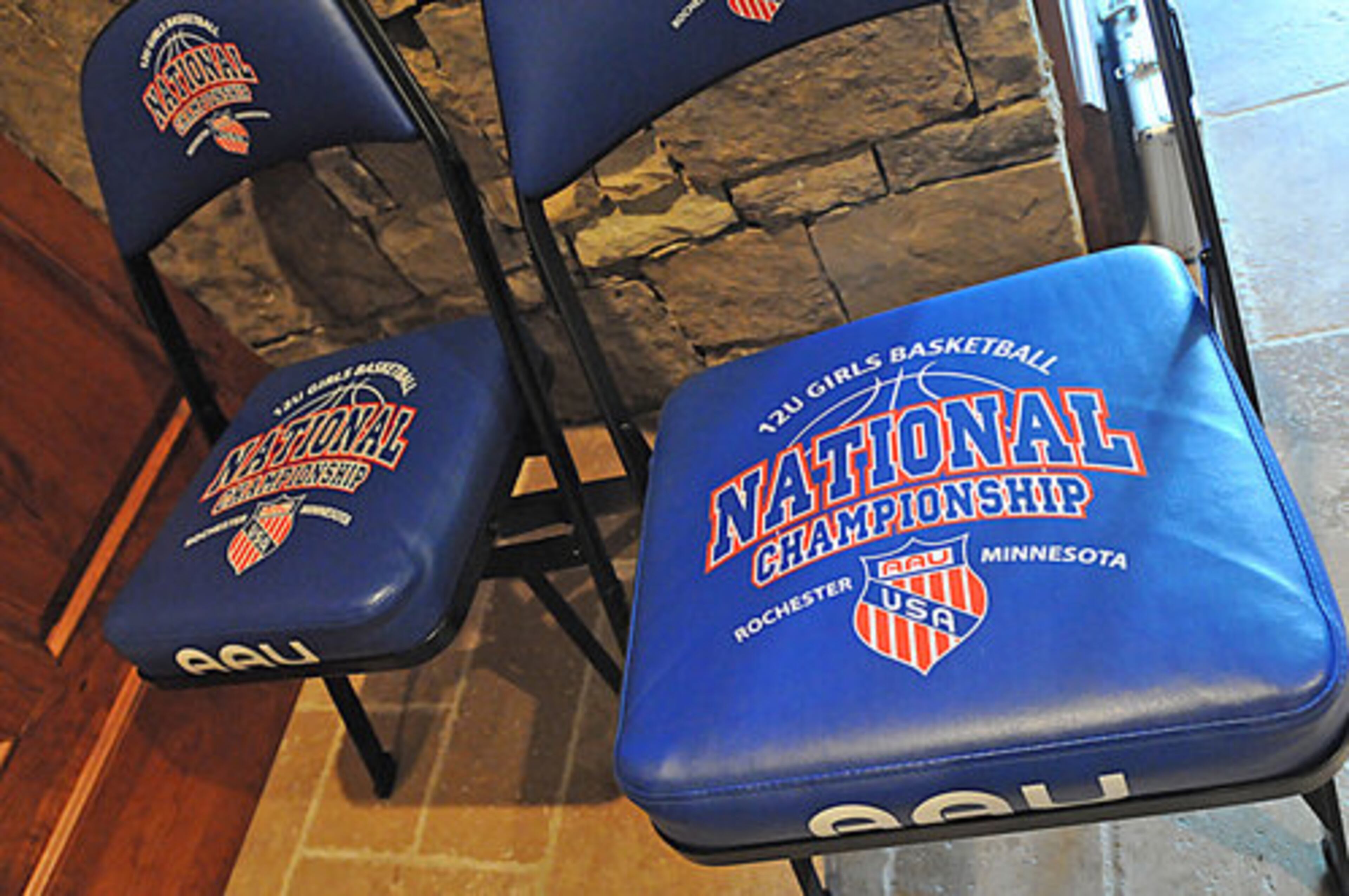 Daughter Kaela is a star player of the Georgia Ice, coached by Antonio. These folding chairs are reminders of their national championship win. She will begin high school in the fall, but Kaela has attended Tennessee's summer camp for elite-level players and is already attracting the interest of college recruiters.