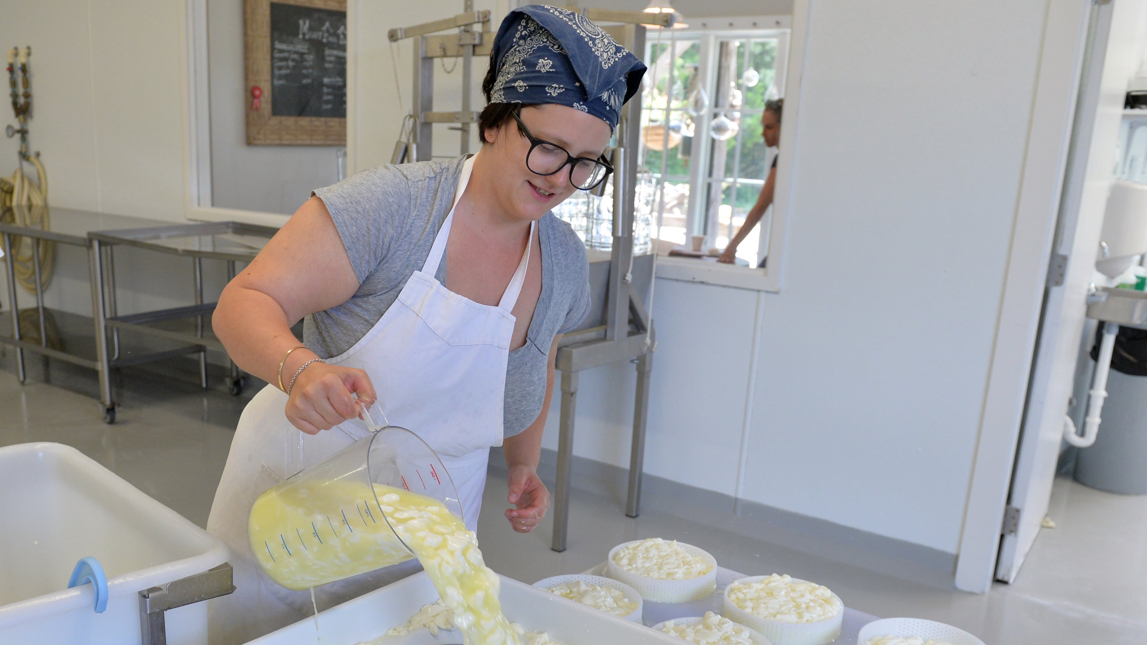 Many Fold Farm owner Rebecca Williams makes cheese from sheep milk in 2014. / AJC file photo