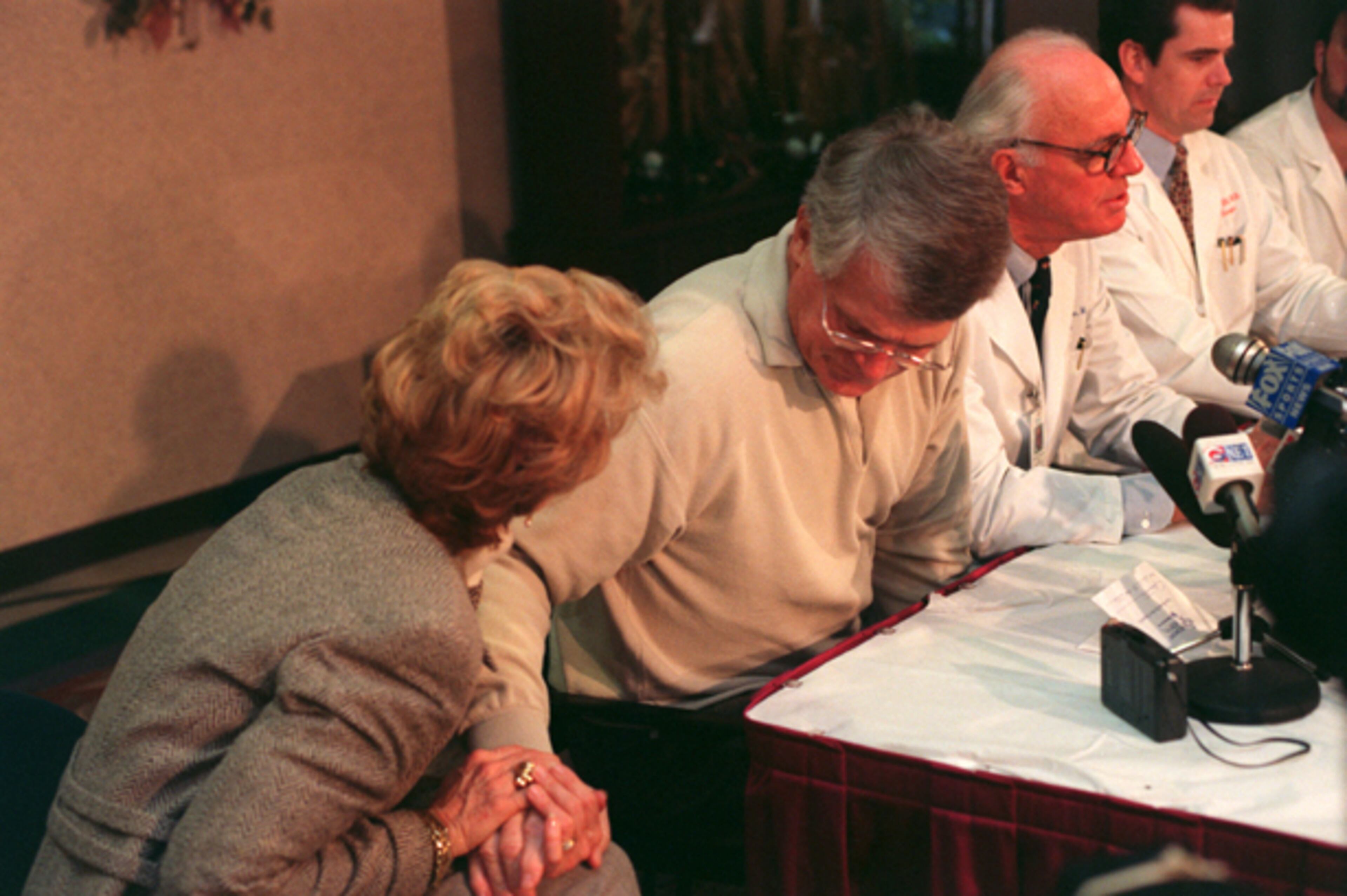 On Dec. 18, 1998, Dan Reeves, along his wife Pam, address questions after he is released from Piedmont Hospital after quadruple bypass heart surgery. Reeves, who had less serious heart problems in 1990 and '91, checked into Piedmont Hospital a day after feeling ill during a 27-17 decision over the New Orleans Saints which gave the Falcons their franchise-tying 12th victory against only two losses.