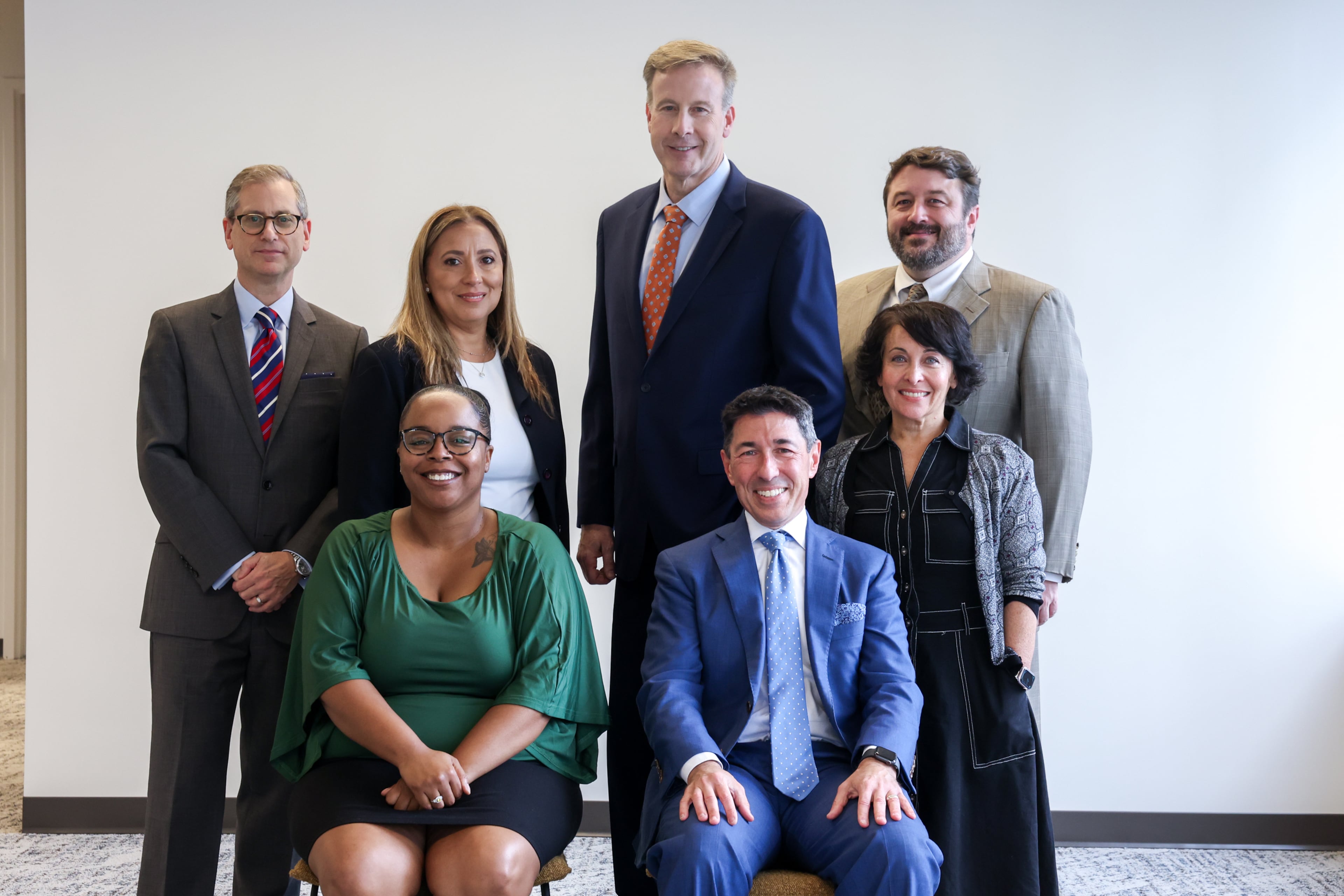 Saul Ewing's Atlanta staff includes (back row, from left) office managing partner Steven Reingold, office manager Janette Lischner, partners Patrick Tracey and Peter Hall, and (bottom row, left) receptionist Ashley Gresham. They were joined at the office opening this month by Jason St. John, the firm's managing partner, and Leslie Gross, its director of communications. (Arvin Temkar/AJC)