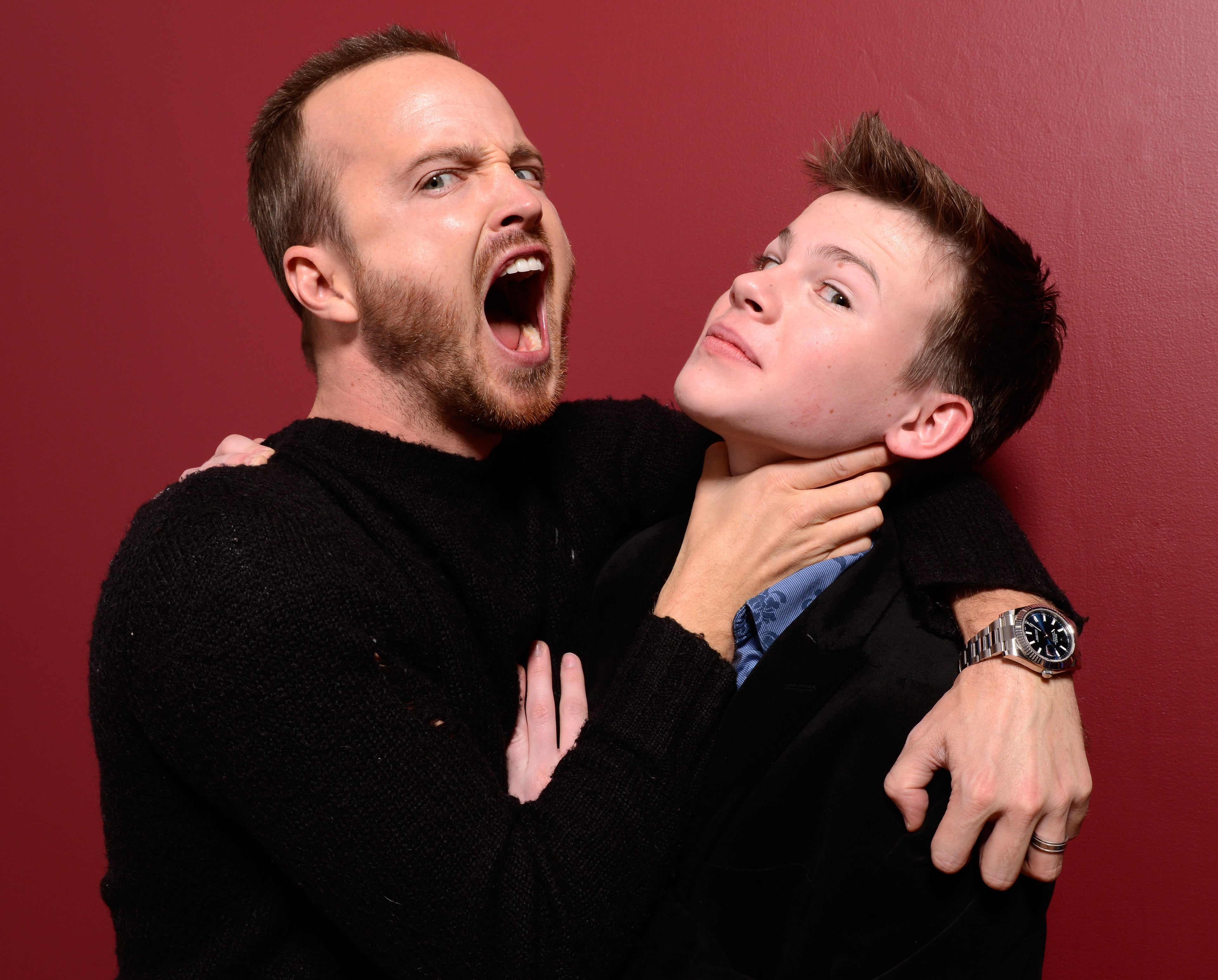 PARK CITY, UT - JANUARY 17: (L-R) Actors Aaron Paul and Josh Wiggins pose for a portrait during the 2014 Sundance Film Festival at the Getty Images Portrait Studio at the Village At The Lift Presented By McDonald's McCafe on January 17, 2014 in Park City, Utah. (Photo by Larry Busacca/Getty Images)