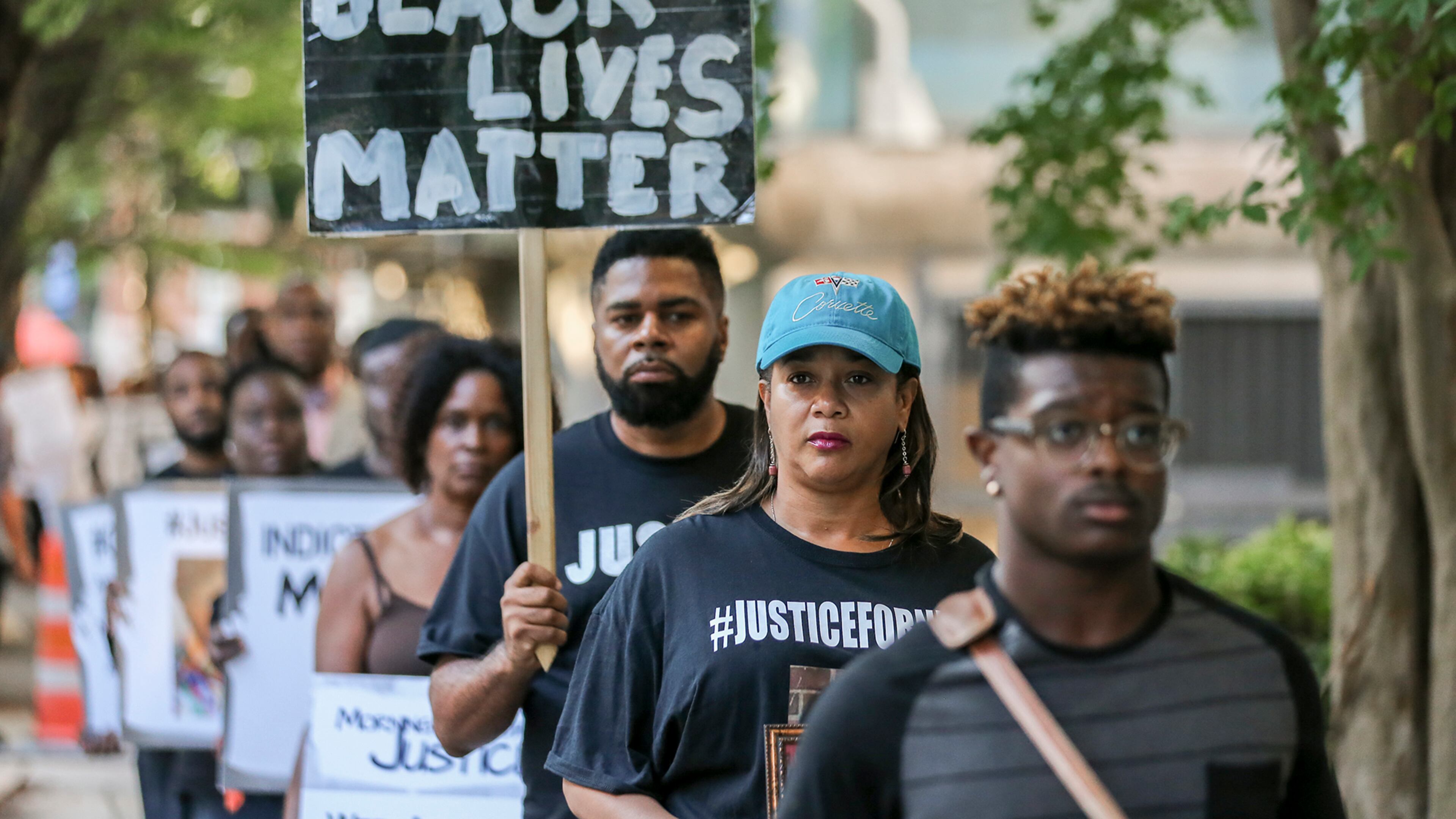Protesters participate in a 24-hour rally outside the Fulton County Justice Center to bring attention to the number of black men killed by police on Wednesday, Aug. 31, 2016. JOHN SPINK /JSPINK@AJC.COM