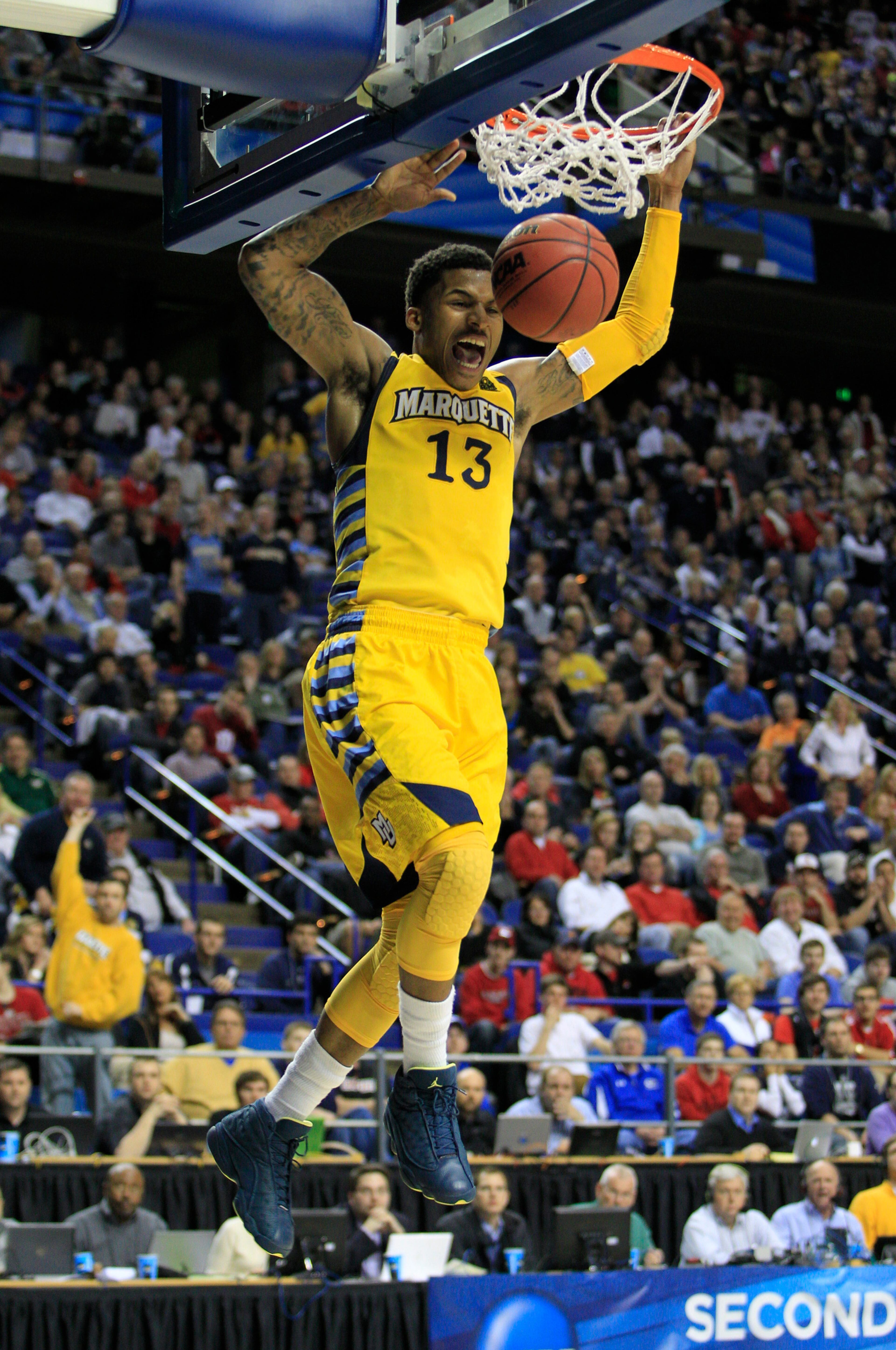 Marquette guard Vander Blue dunks against Butler in the second half of the third round of the NCAA Tournament at Rupp Arena in Lexington, Kentucky, Saturday, March 23, 2013. Marquette defeated Butler, 74-72. (Jonathan Palmer/Lexington Herald-Leader/MCT)