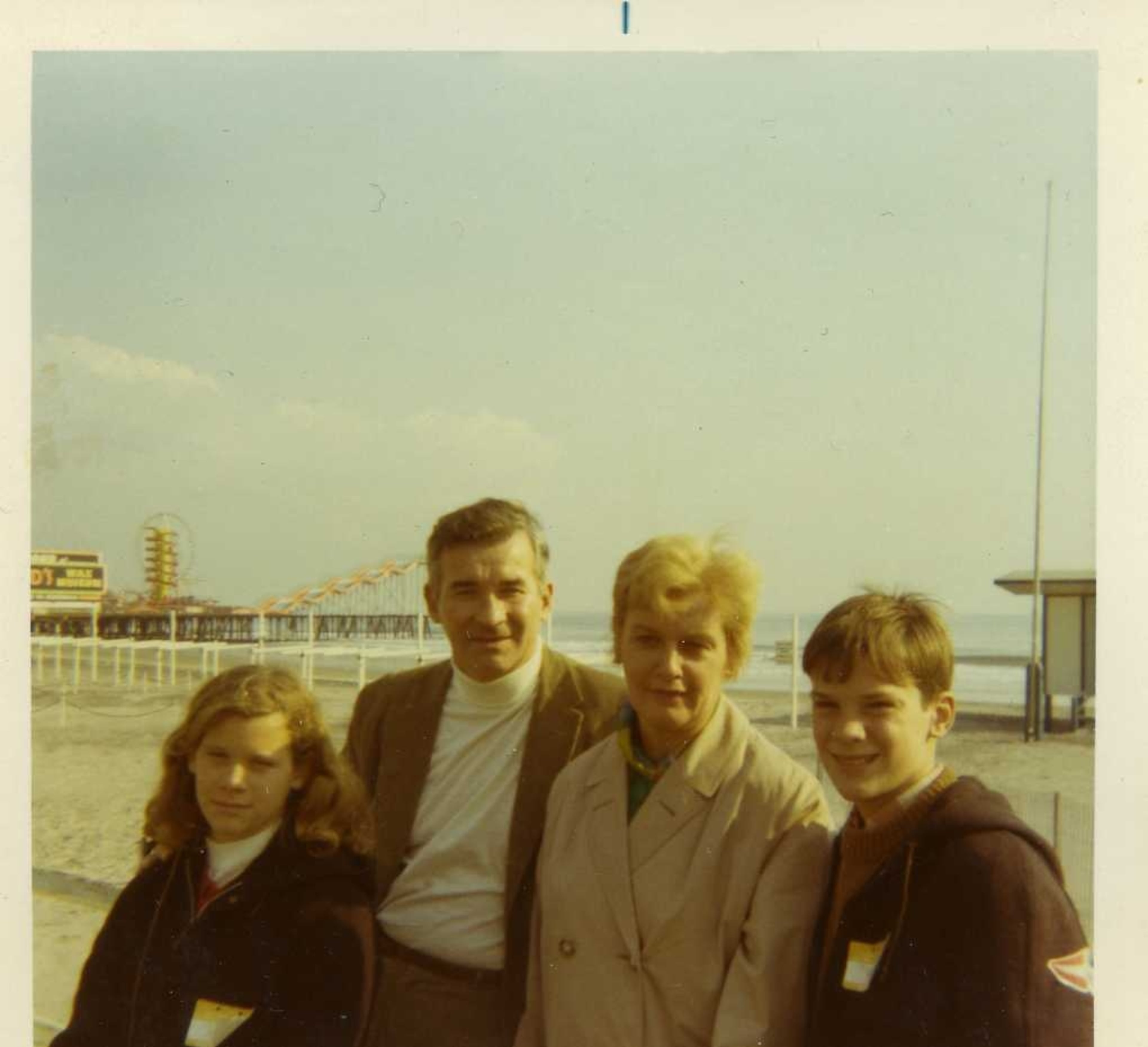 Jill Vejnoska poses with her parents, Larry and Sally, and now deceased brother, Mark, on the boardwalk in Atlantic City. The area was among the hardest hit by Hurricane Sandy.