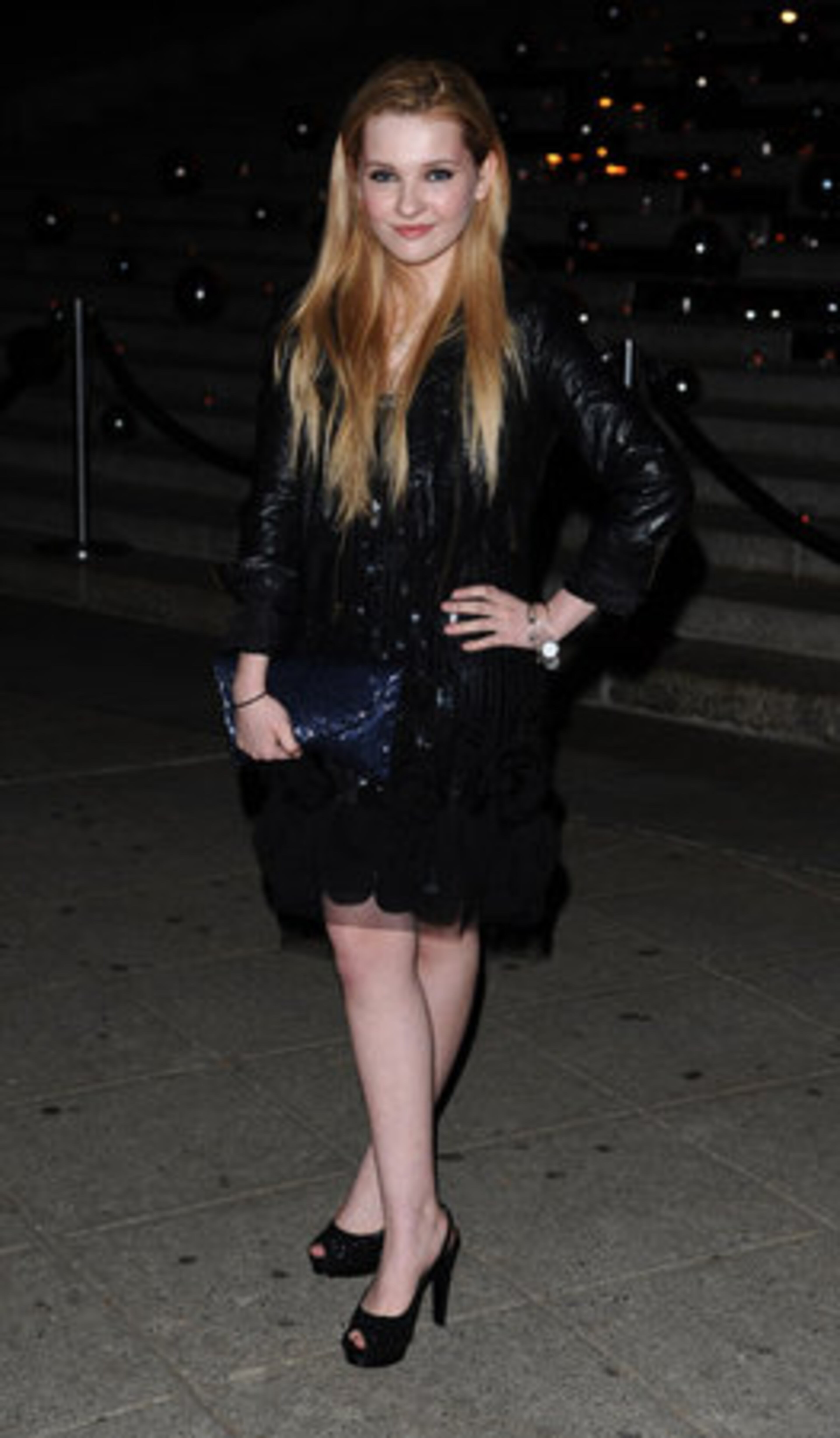 Abigail Breslin arrives at the party looking unrecognizably adult.