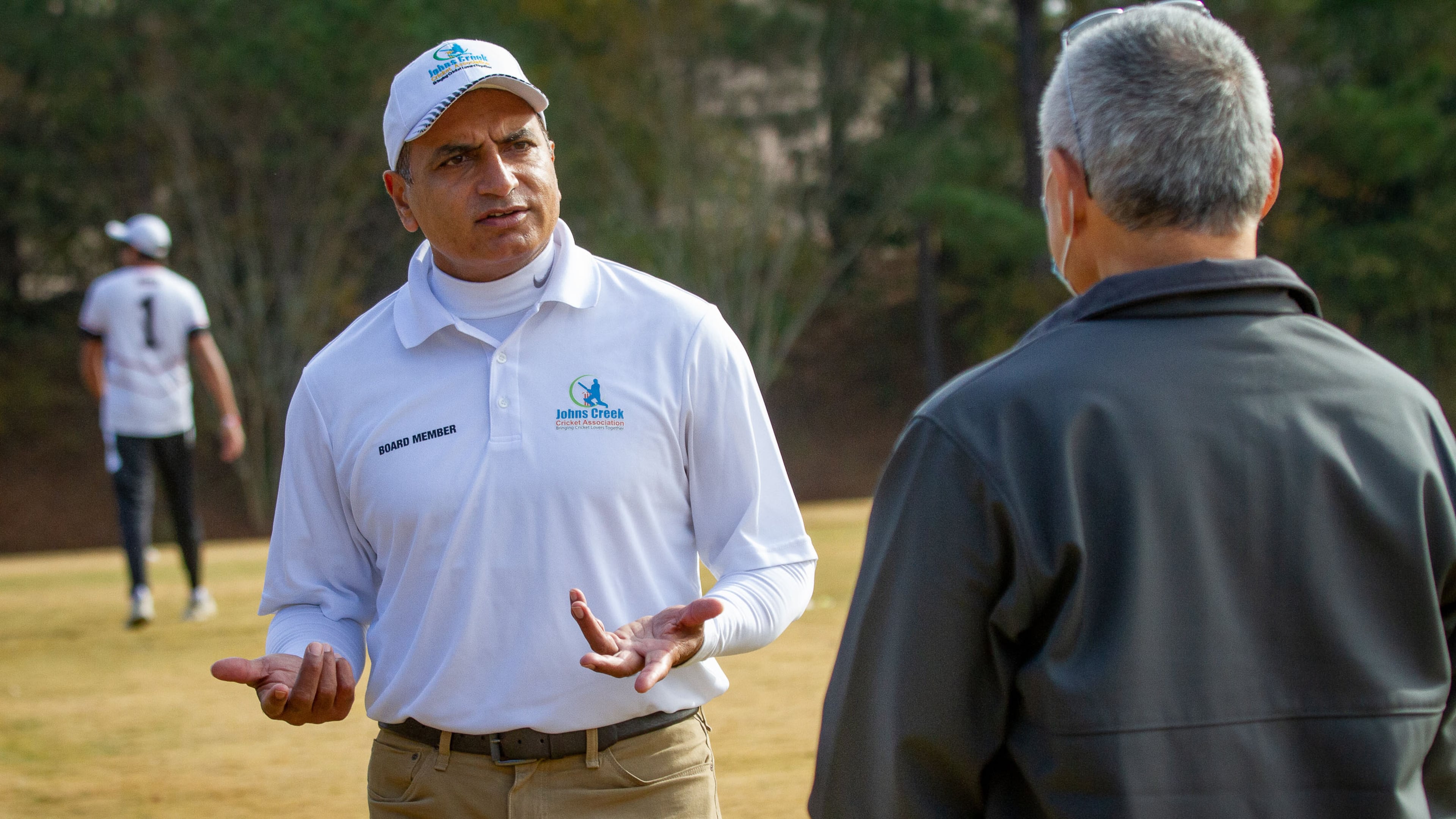 President of the Johns Creek Cricket Association Shafiq Jadvji talks with people on the sidelines before the start of the match between Lambert High School and Northview High School at Shakerag Park in Johns Creek Sunday, November 6, 2020. STEVE SCHAEFER FOR THE ATLANTA JOURNAL-CONSTITUTION