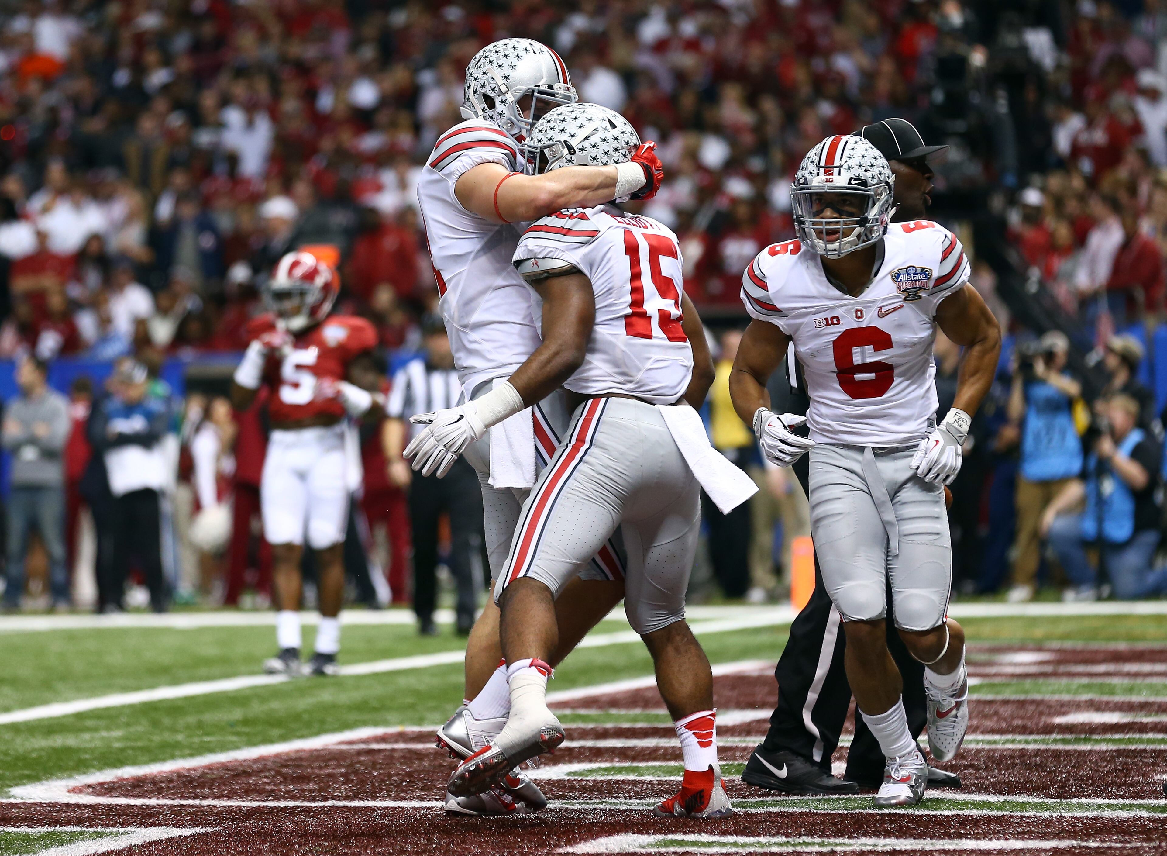 Ezekiel Elliott #15 of the Ohio State Buckeyes celebrates with his teammate Nick Vannett #81 after scoring a touchdown in the second quarter against the Alabama Crimson Tide during the All State Sugar Bowl at the Mercedes-Benz Superdome on January 1, 2015 in New Orleans, Louisiana. (Photo by Streeter Lecka/Getty Images)